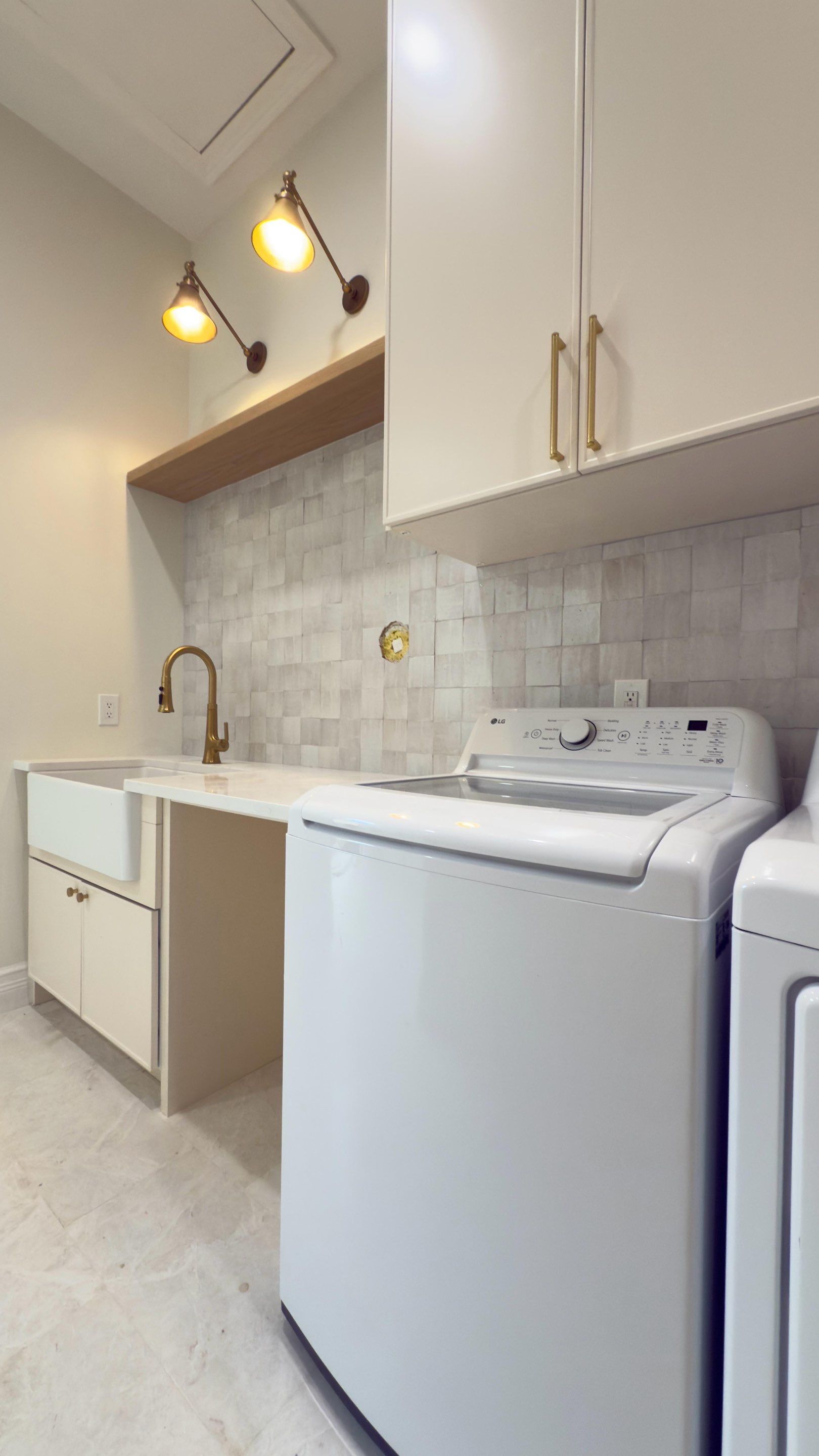 Laundry Room accent wall in Boca Raton by Broward Tile Guys