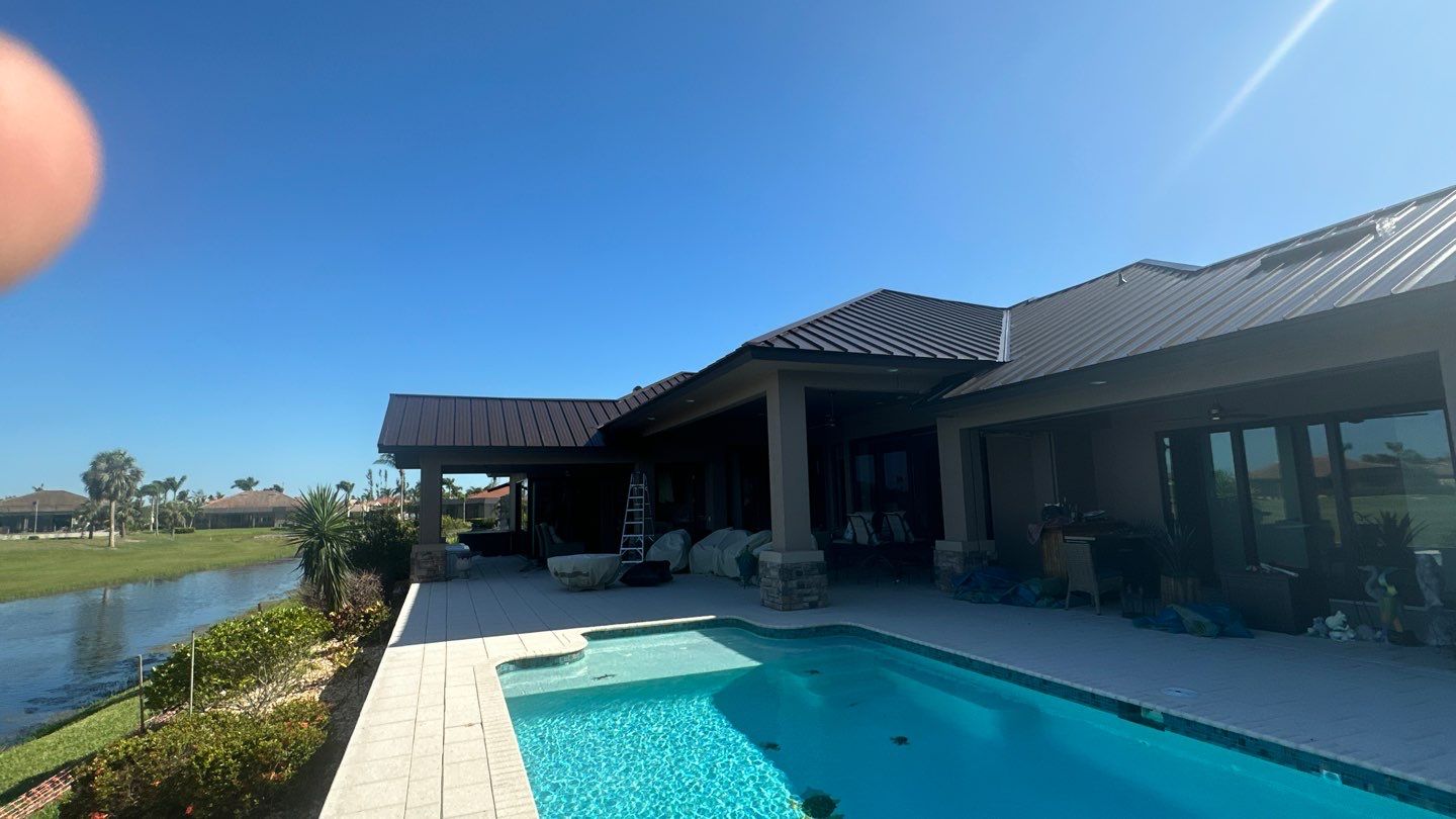 Residential Roofing Installation using Standing Seam Metal Roof in Cape Coral, FL by International Roofing