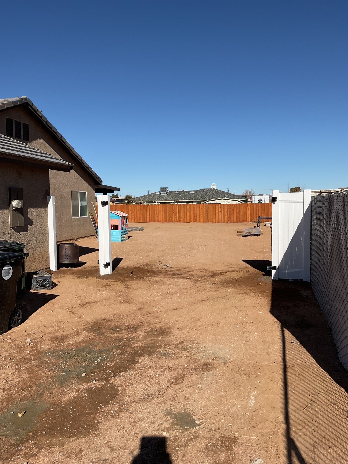Gate installation using Vinyl by Fence Guys Inc. 