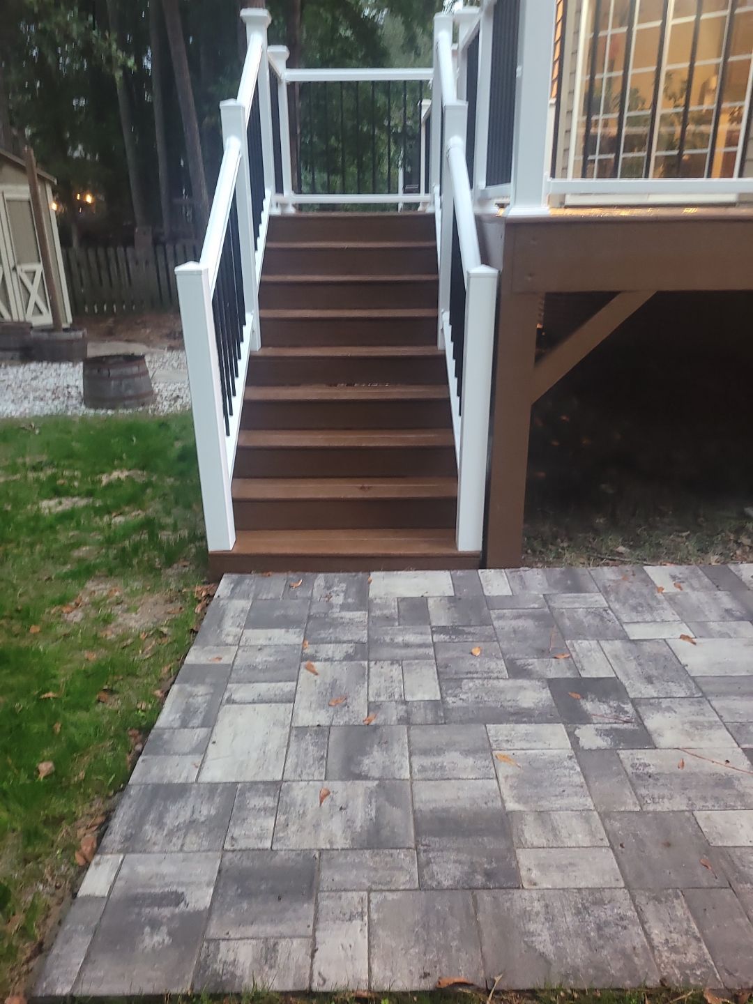 Fuquay-Varina Outdoor Upgrade – Composite Deck & Paved Landing by Elite Remodeling and Design LLC