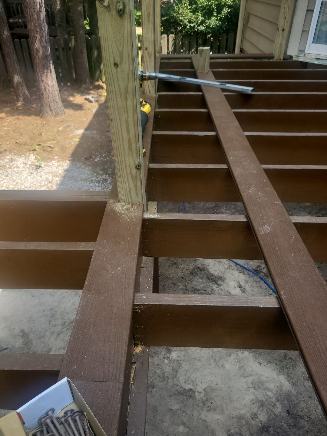 Fuquay-Varina Outdoor Upgrade – Composite Deck & Paved Landing by Elite Remodeling and Design LLC
