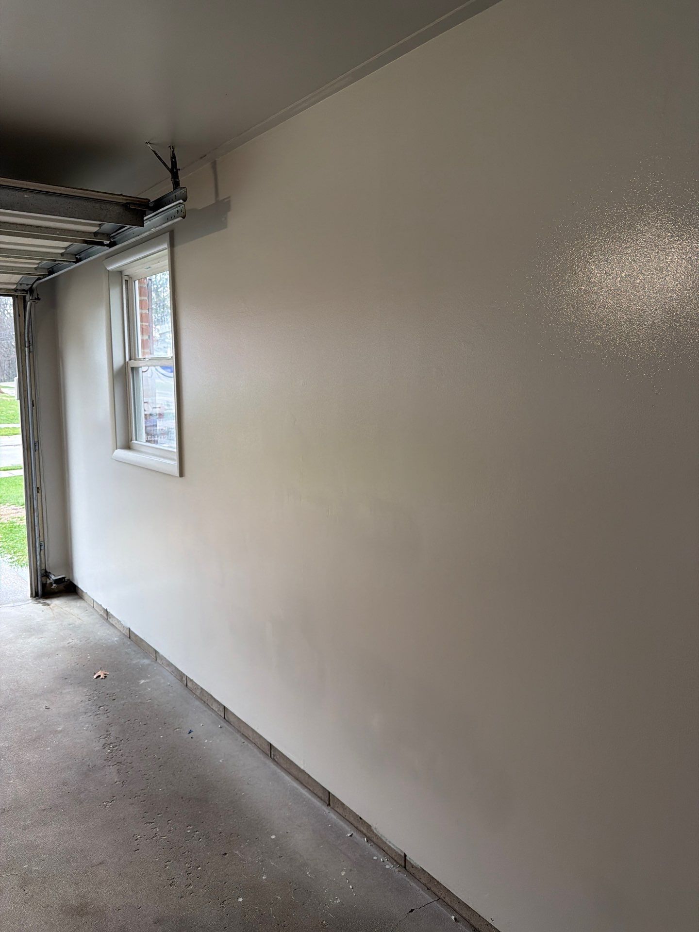 Muskegon Garage Interior Painting and Epoxy Flake Floor Installation by Gordon Painting