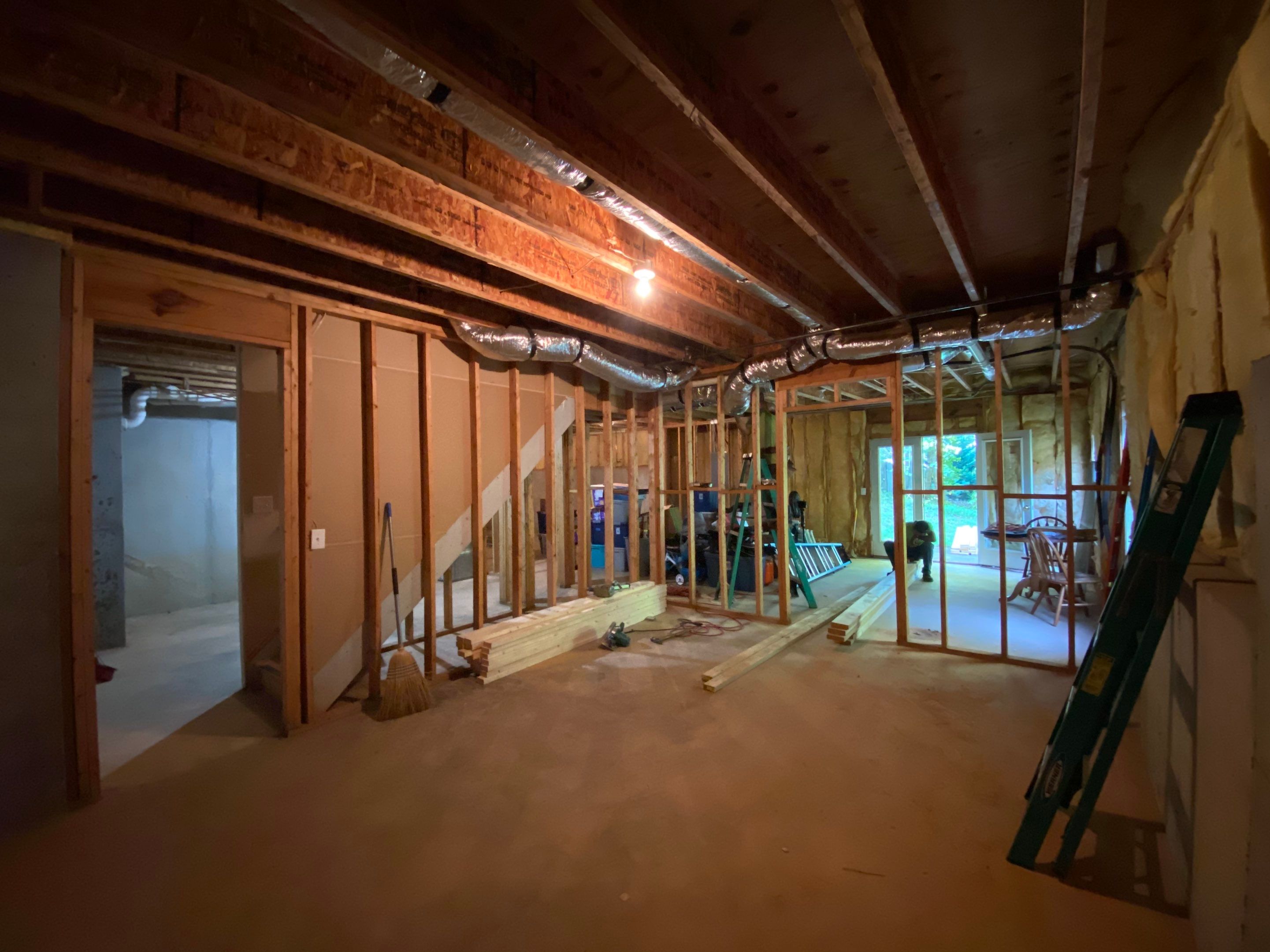 Finished Basement Transformation With Luxury Vinyl Plank Flooring in Acworth by Swift Home Renovations