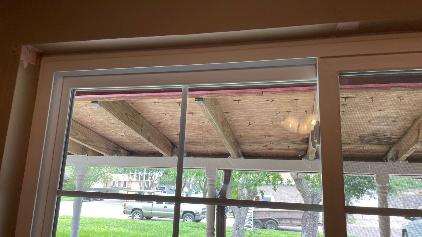 Black and white and red all over by Bayfront Roofing and Construction