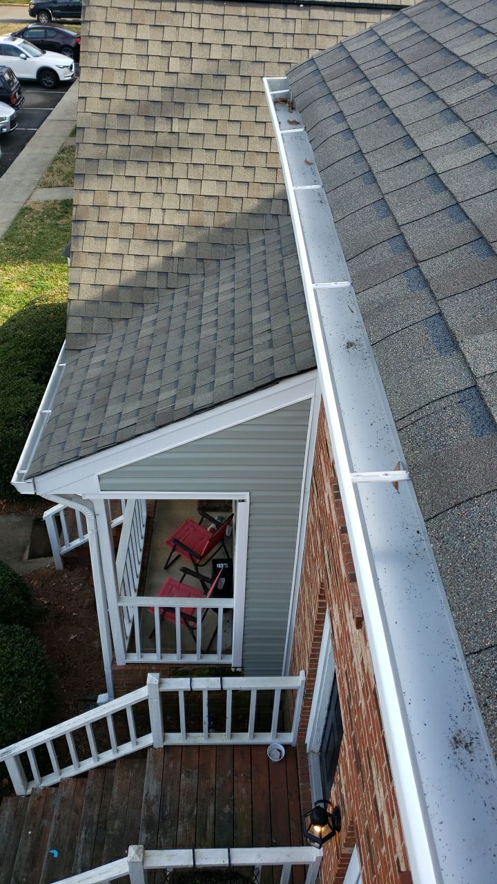 Gutter Cleaning using water by Power Wash Masters LLC