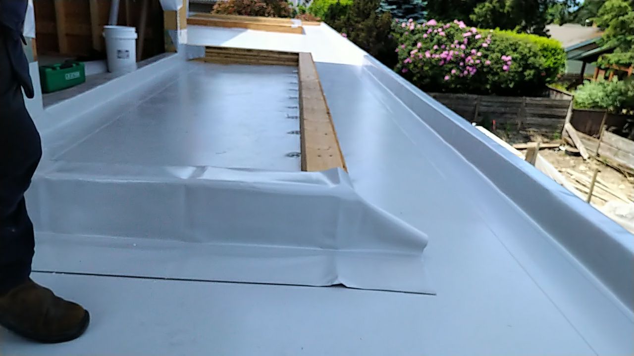 Residential Roofing Installation using Durolast roofing membrane by Top Notch Roofing Inc