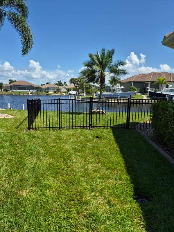 Custom Black Aluminum Fence Enclosure for Punta Gorda Waterfront Property by True Fence LLC