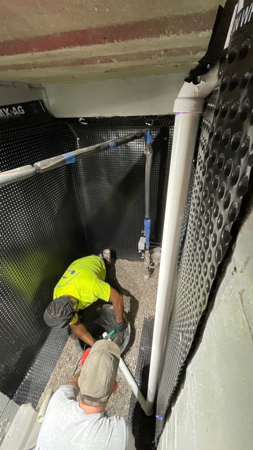 Interior Drain Tile & Sump Pump System in West Minneapolis by Waterproofing Northeast