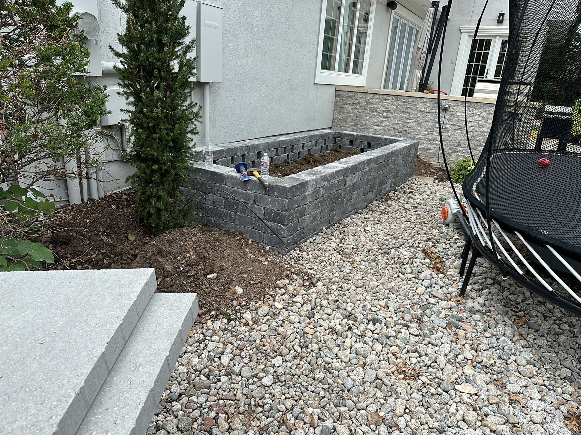 Back Yard Pool Sidewalk and Landscape by LAND ESCAPES LLC