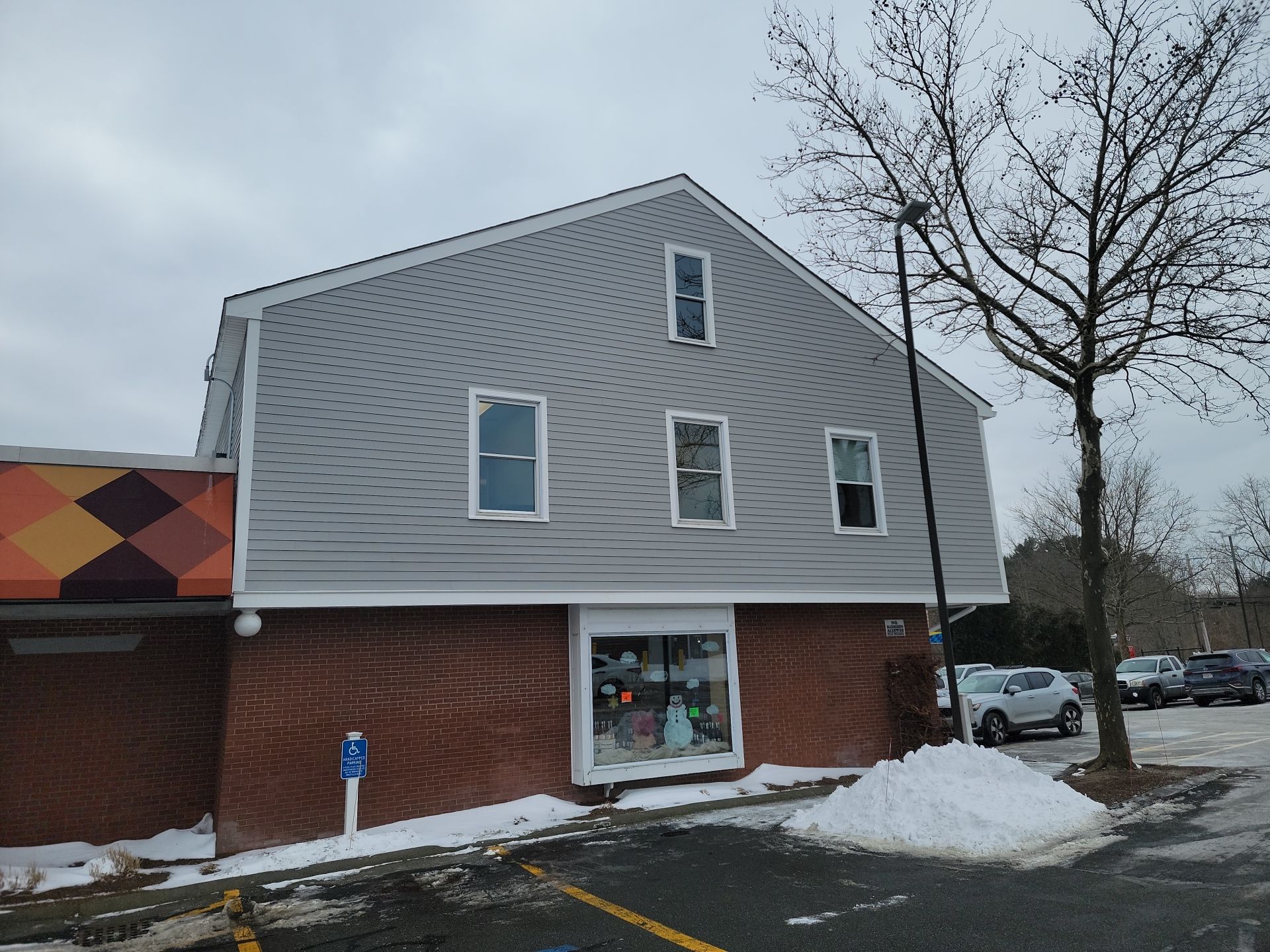 James Hardie Siding on Comercial building by UBrothers Construction