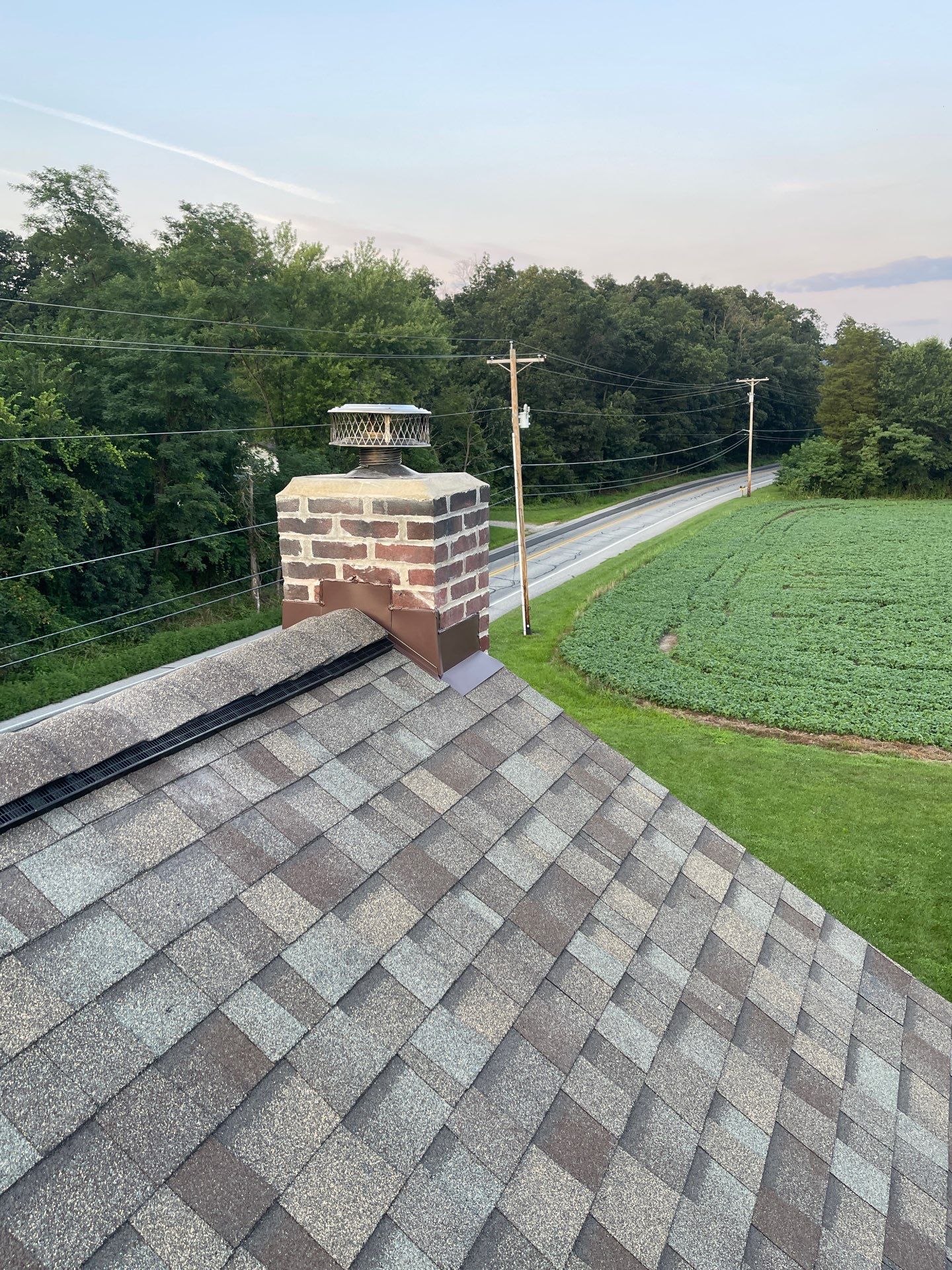 Roof Replacement and Chimney Restoration with Shutter Upgrade in East Berlin, Pennsylvania by Bealing Roofing & Exteriors