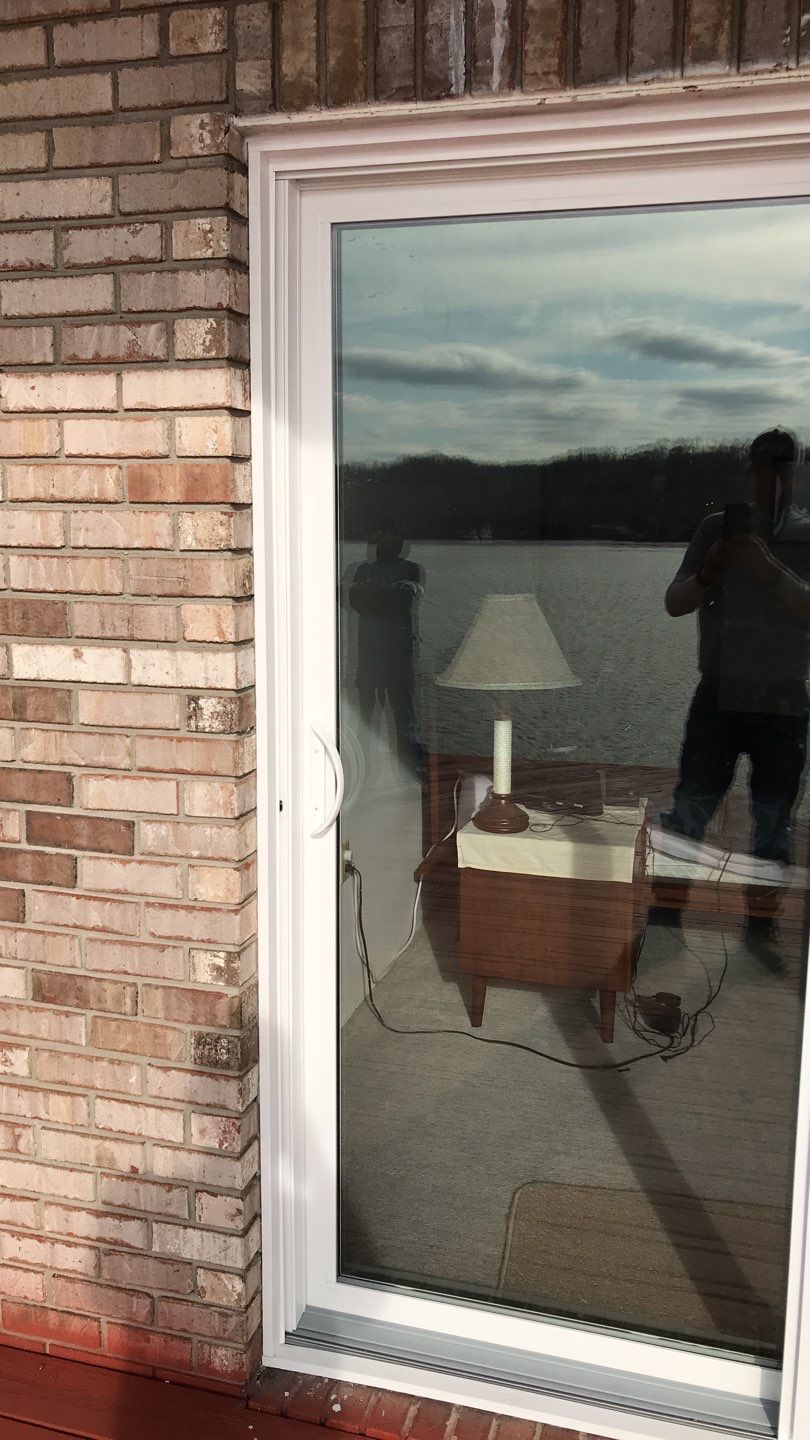 Deck Refurbush and Door Replacement using Trex Decking and Railing. Polaris Patio Doors by Secure Construction Company Inc
