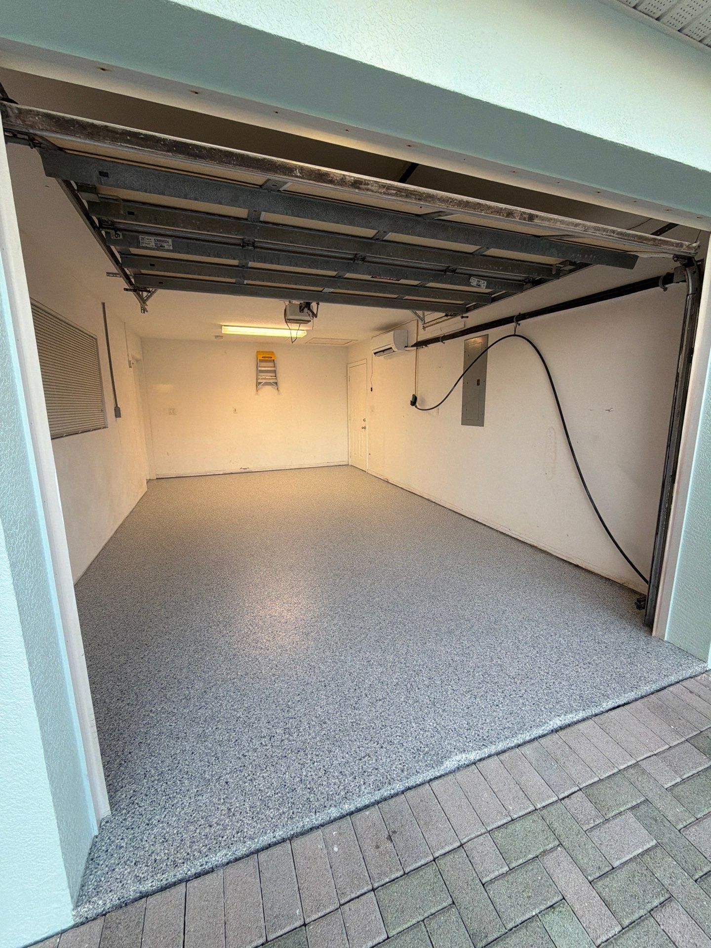 “Tidal Wave” Garage Floor in Key Colony Beach, FL by Tropical Epoxy Coatings & Creations LLC 