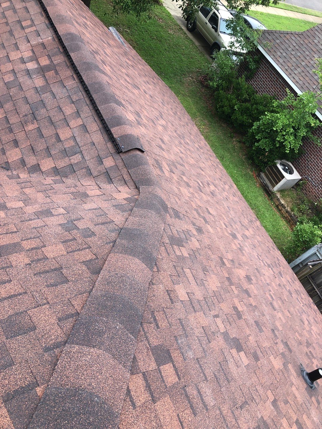 Residential Roofing Installation using Roof Replacement by American Roofing & Construction LLC