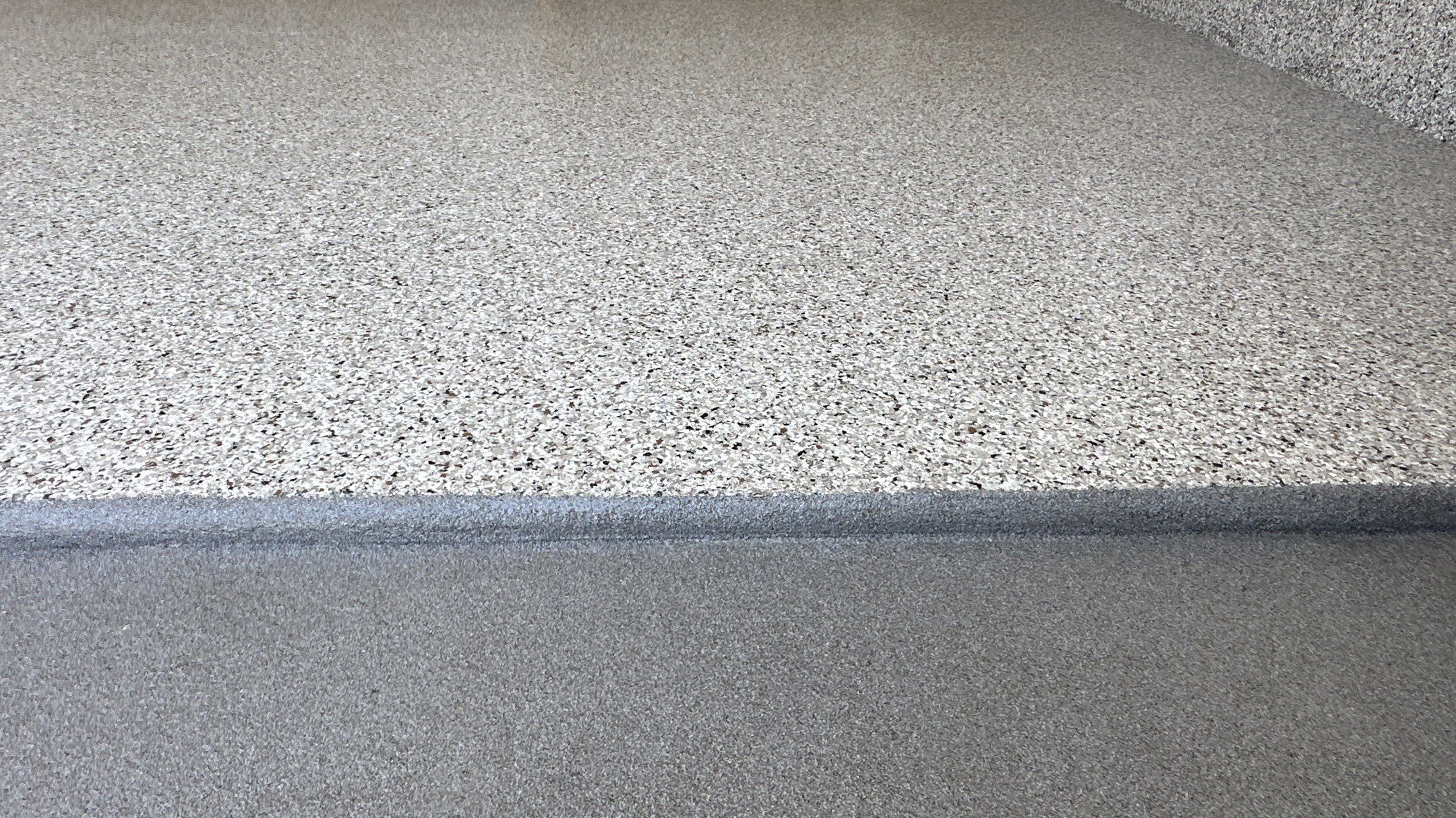 Phil B. new floor with Coyote flake by Banner Garage