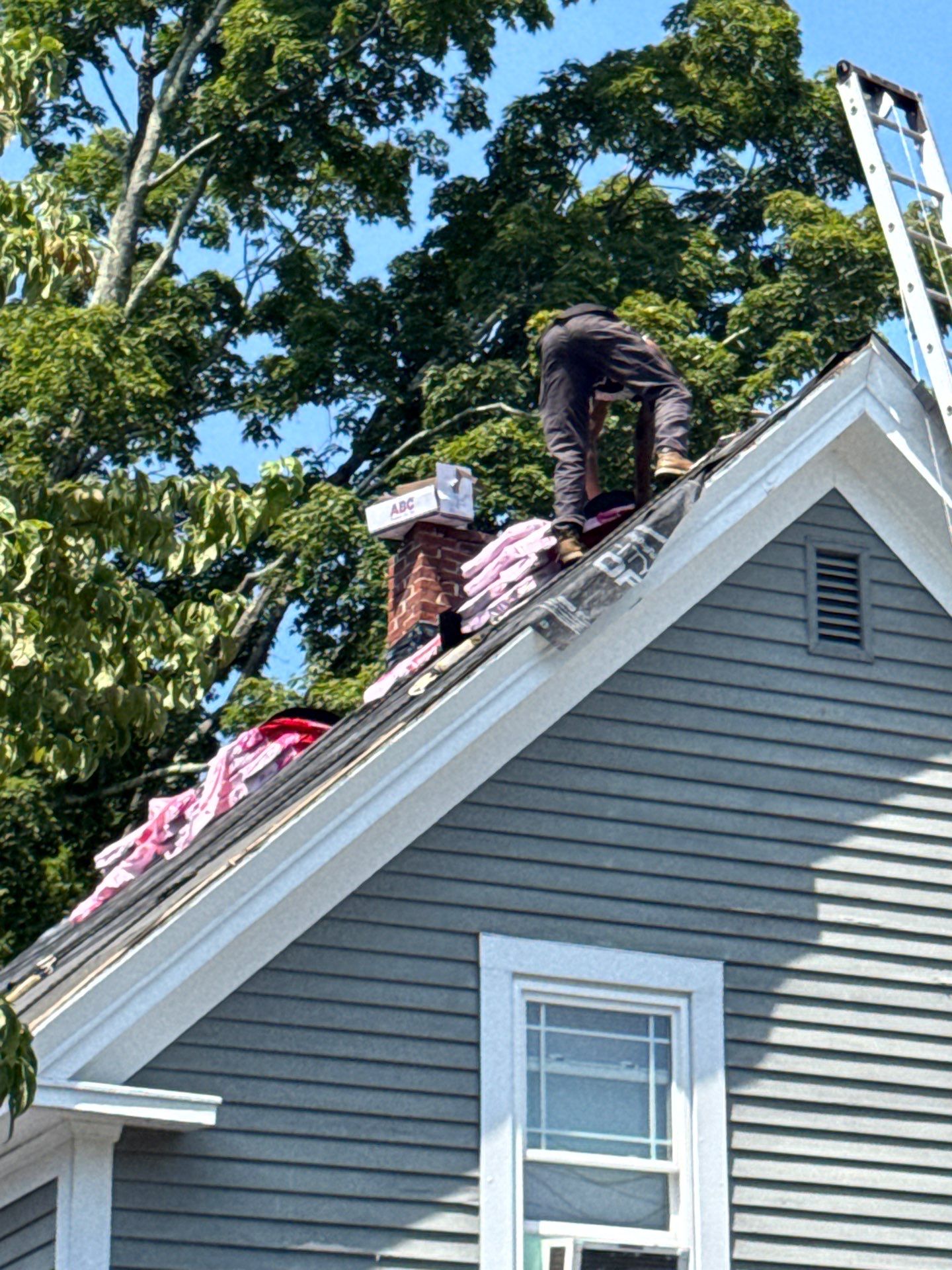 Full Roof Replacement + Custom Gutter Install | Onyx Black Finish by Mighty Dog Roofing of Greater Middlesex County