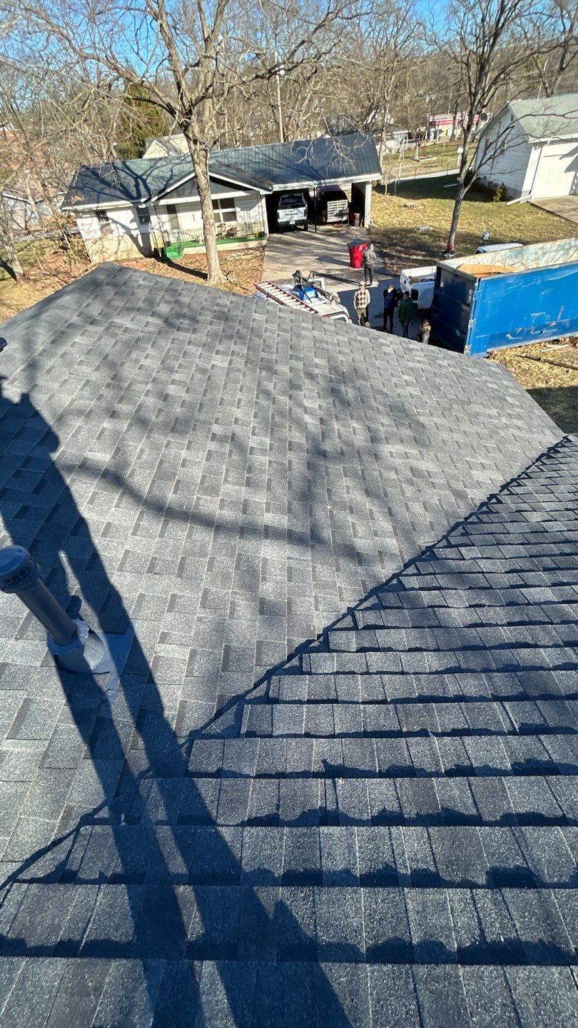 Residential Roof + Gutters & Downspouts Install  by Titan Commercial & Residential Roofing 