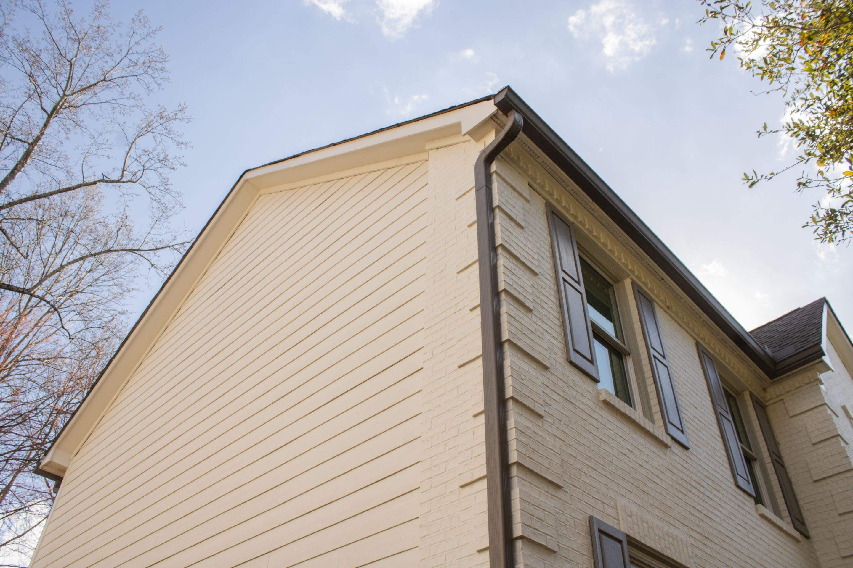 Exterior Painting, James Hardie Siding Install, and Gutter Replacement in Alpharetta, GA - After Results Taken Six Years After Painted by Nelson Exteriors 