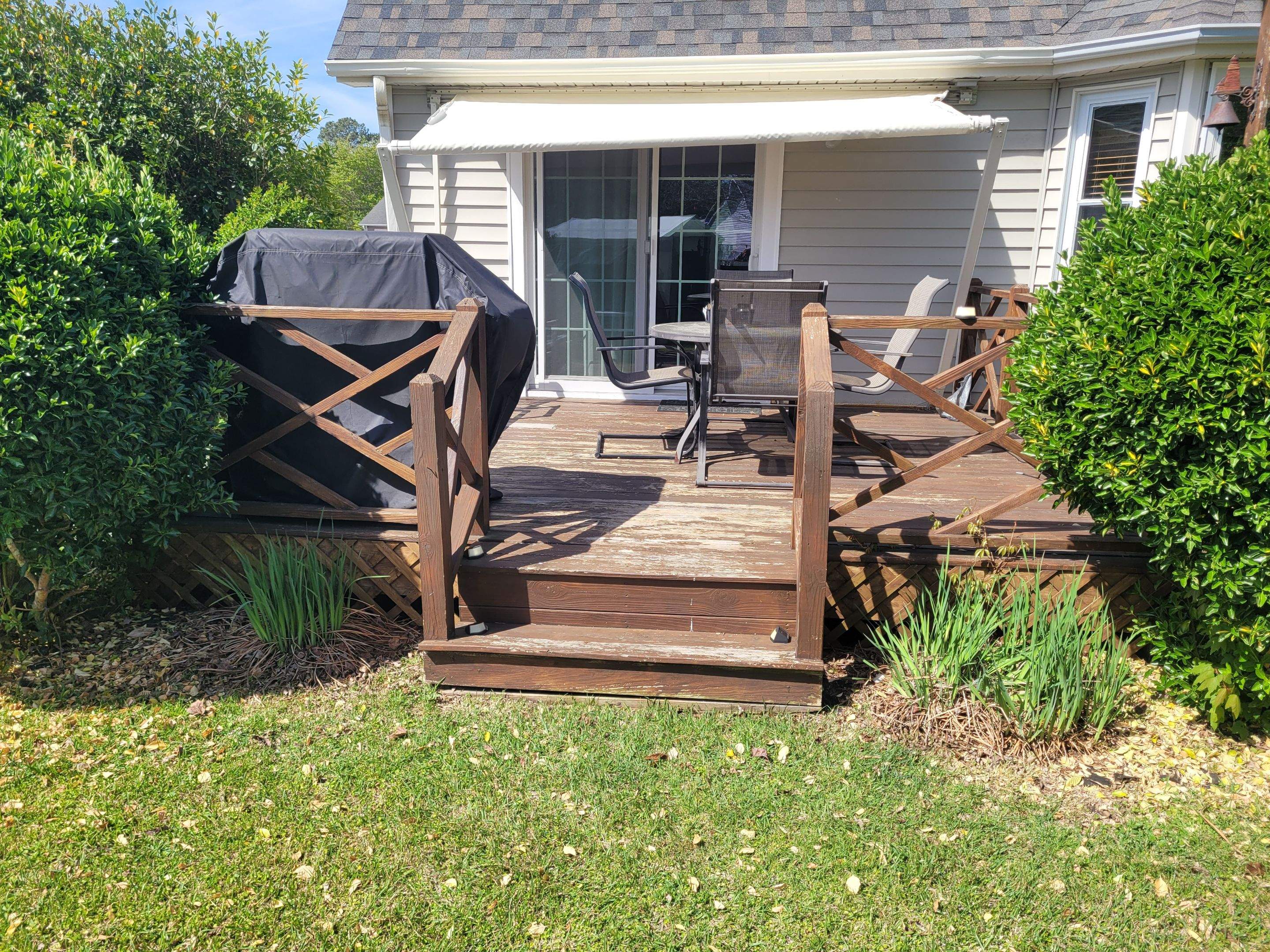 Pressure-Treated Wood Deck Resurface and Railing Upgrade in Havelock by The Remodeling Company