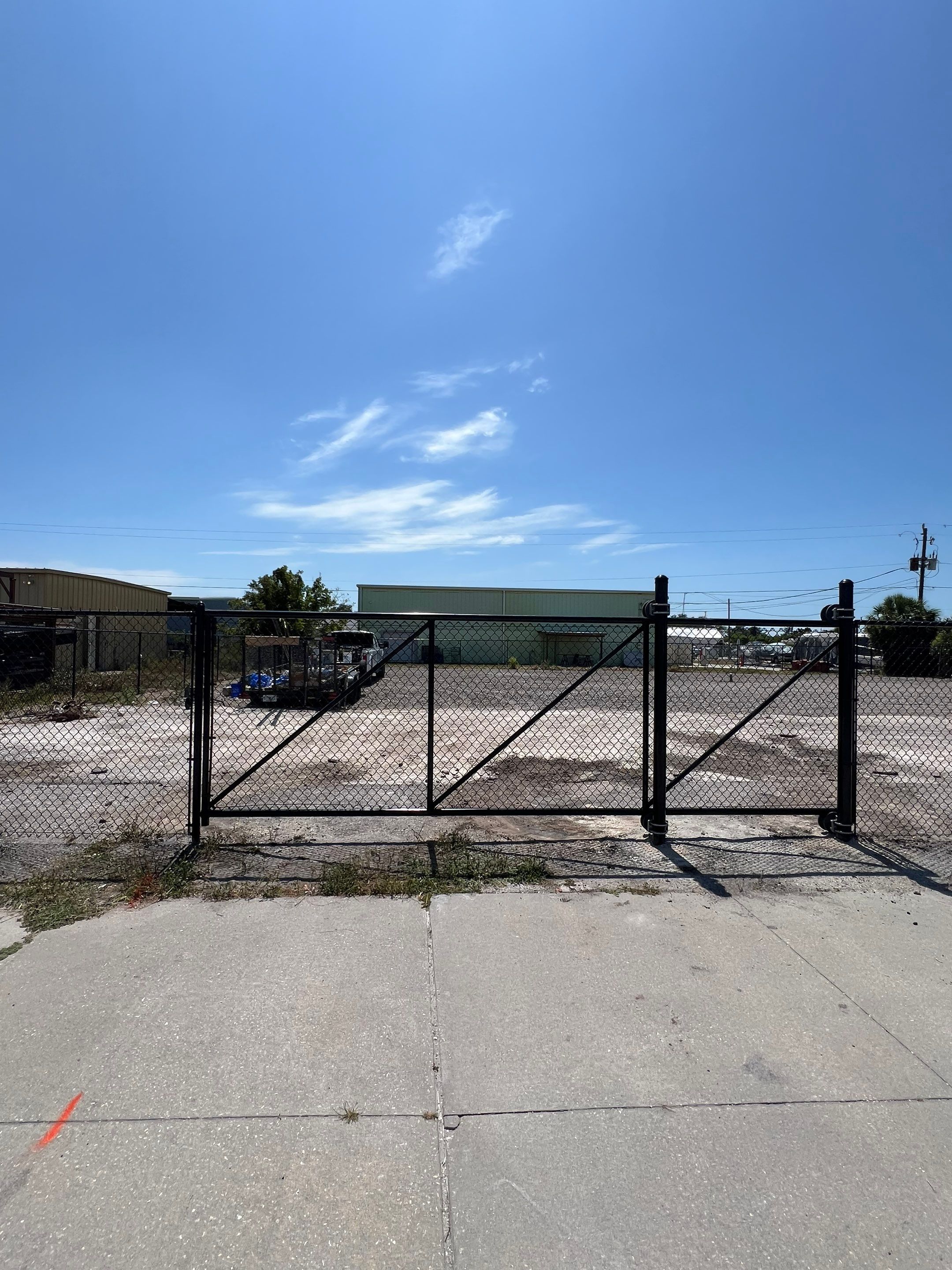 Chain-link Fence Installation using 6ft Black Chain Link Fence  by Asap fence and gates, LLC