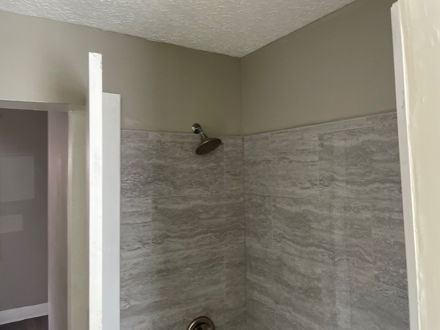 Rental Property Restoration, siding, flooring, gutters, landscaping by Storm Contracting 