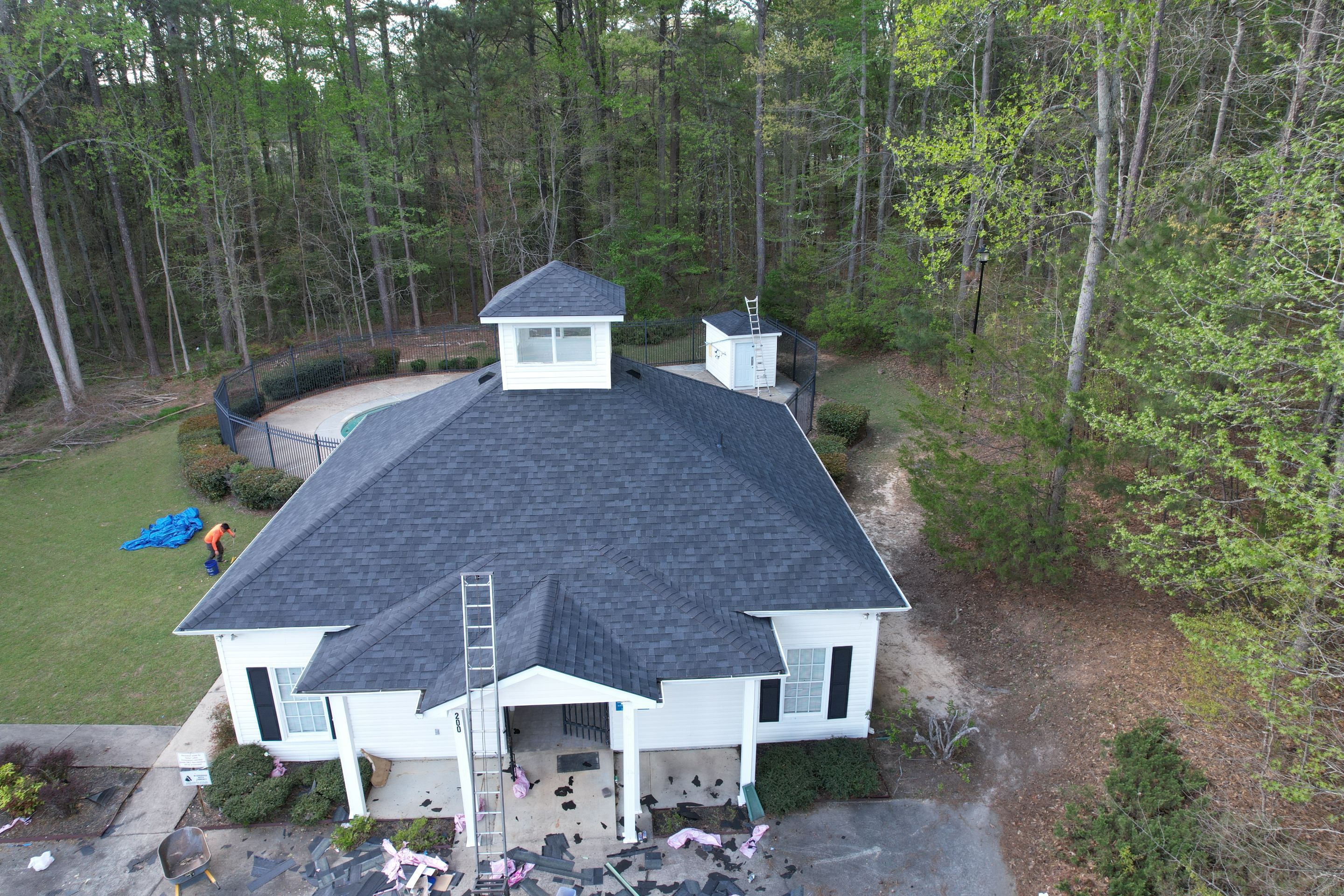 Pool House Roof Replacement using Owens Corning Onyx Black by Inspector Roofing and Restoration