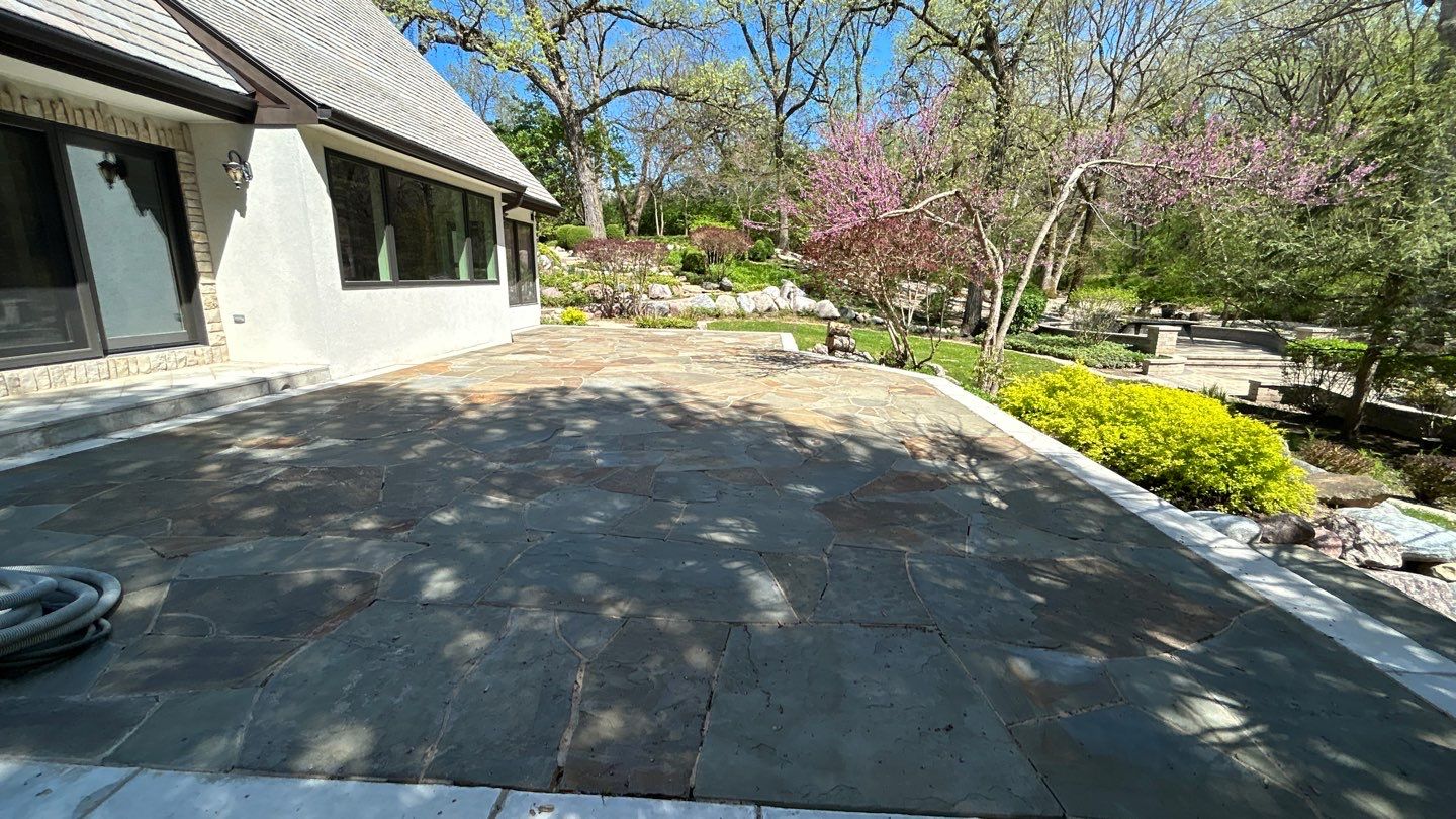 natural stone using Algaecide, soft wash soap by Northern Power Washing LLC.