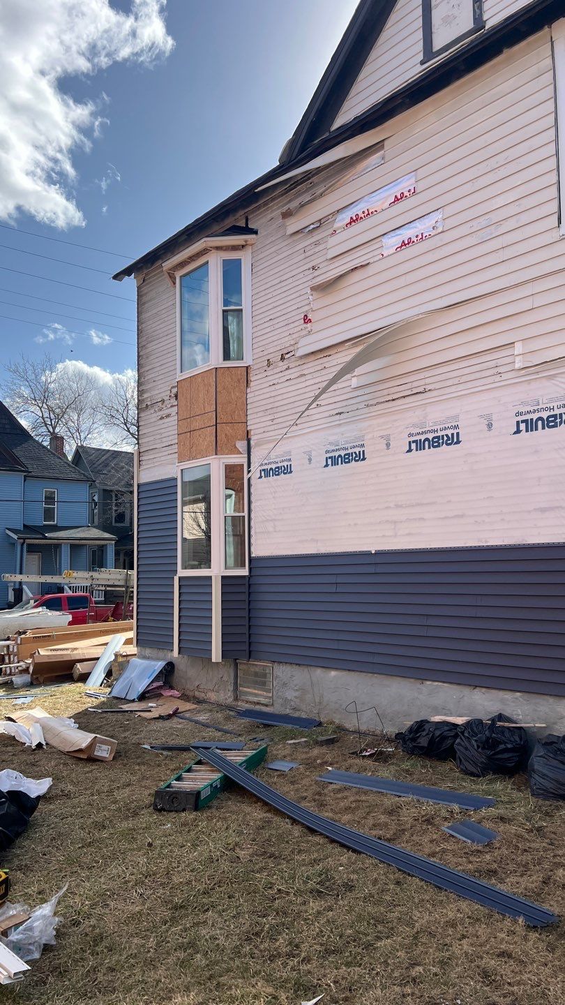 Adding Windows and installing Siding by Know-A-Guy Roofing & Exteriors