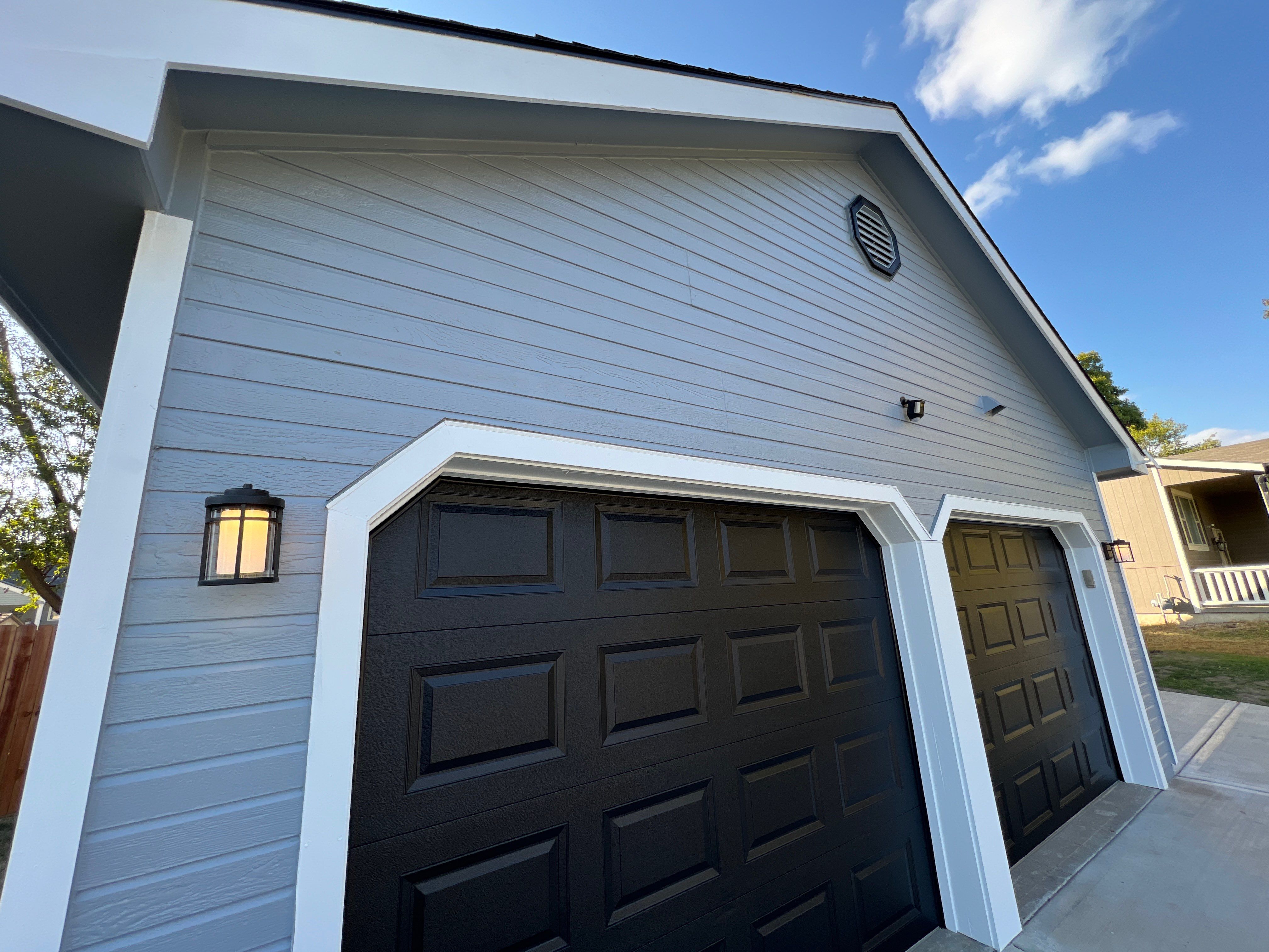 Exterior Painting by HT Roofing & Construction, INC