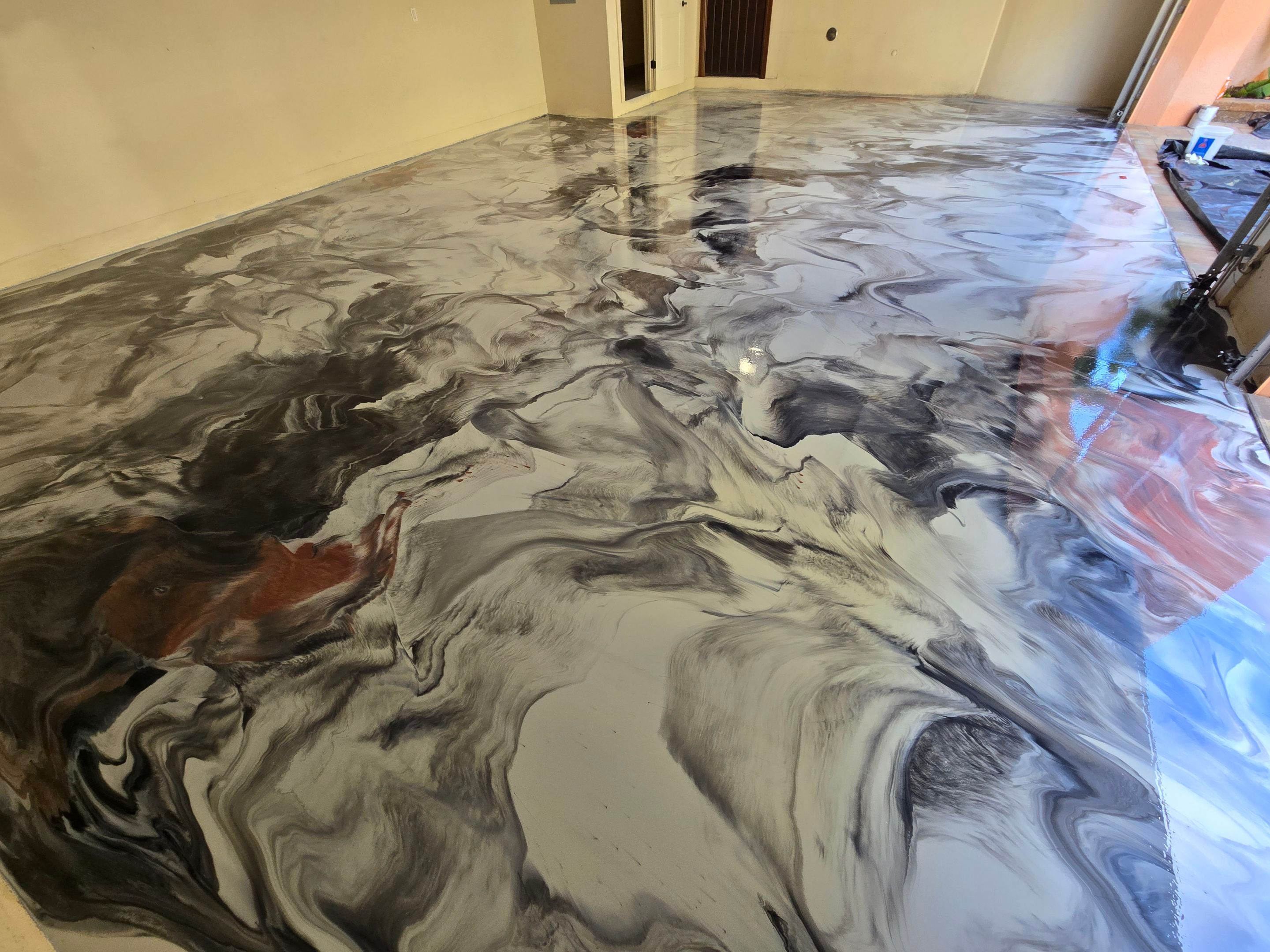 High-Gloss Black & White Metallic Marble Finish by Performance Floors & Coating