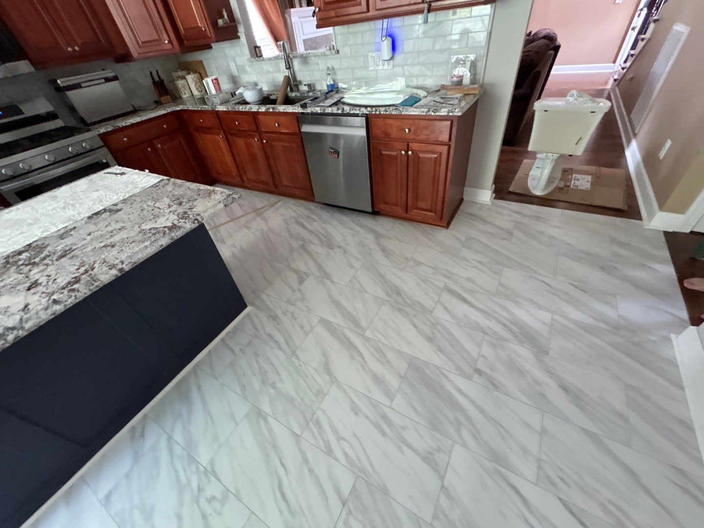 Kitchen floor refresh  by Footprints Floors of Nashville