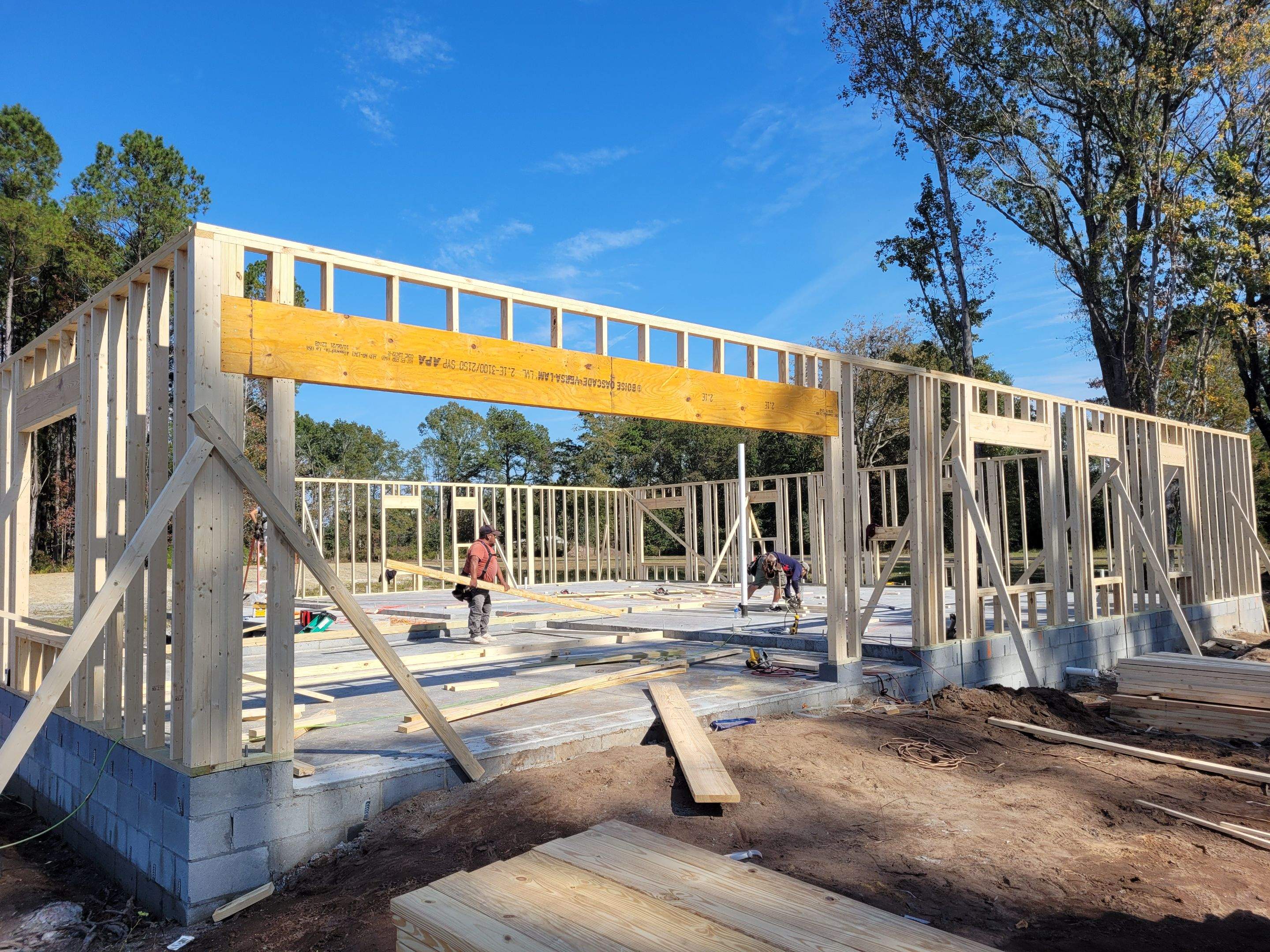 New Home Construction using brick and vertical vinyl by Cornerstone Home Builders, LLC