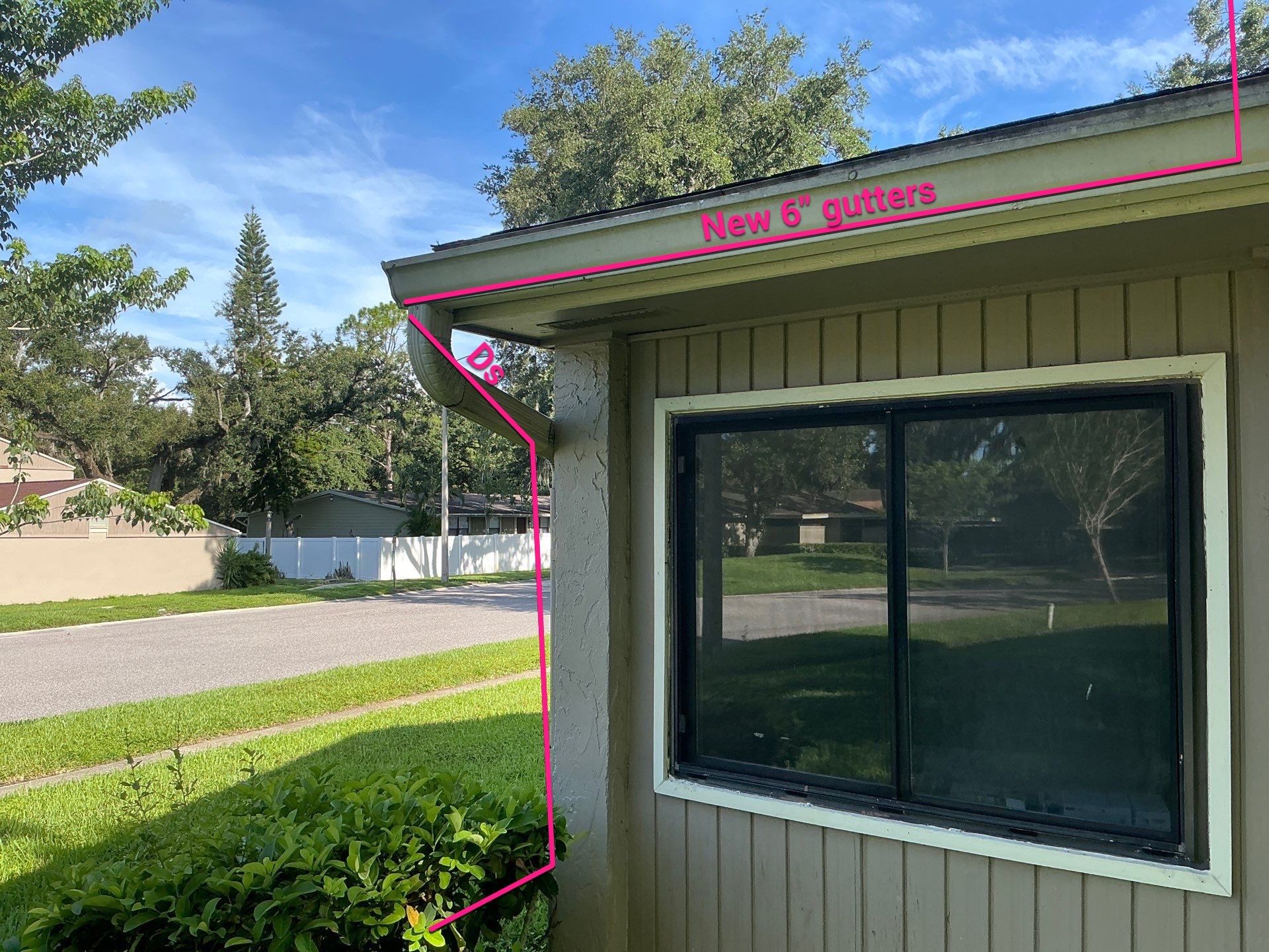 Professional Downspout Installation in Tampa, FL by Gutter Professor by Gutter Professors