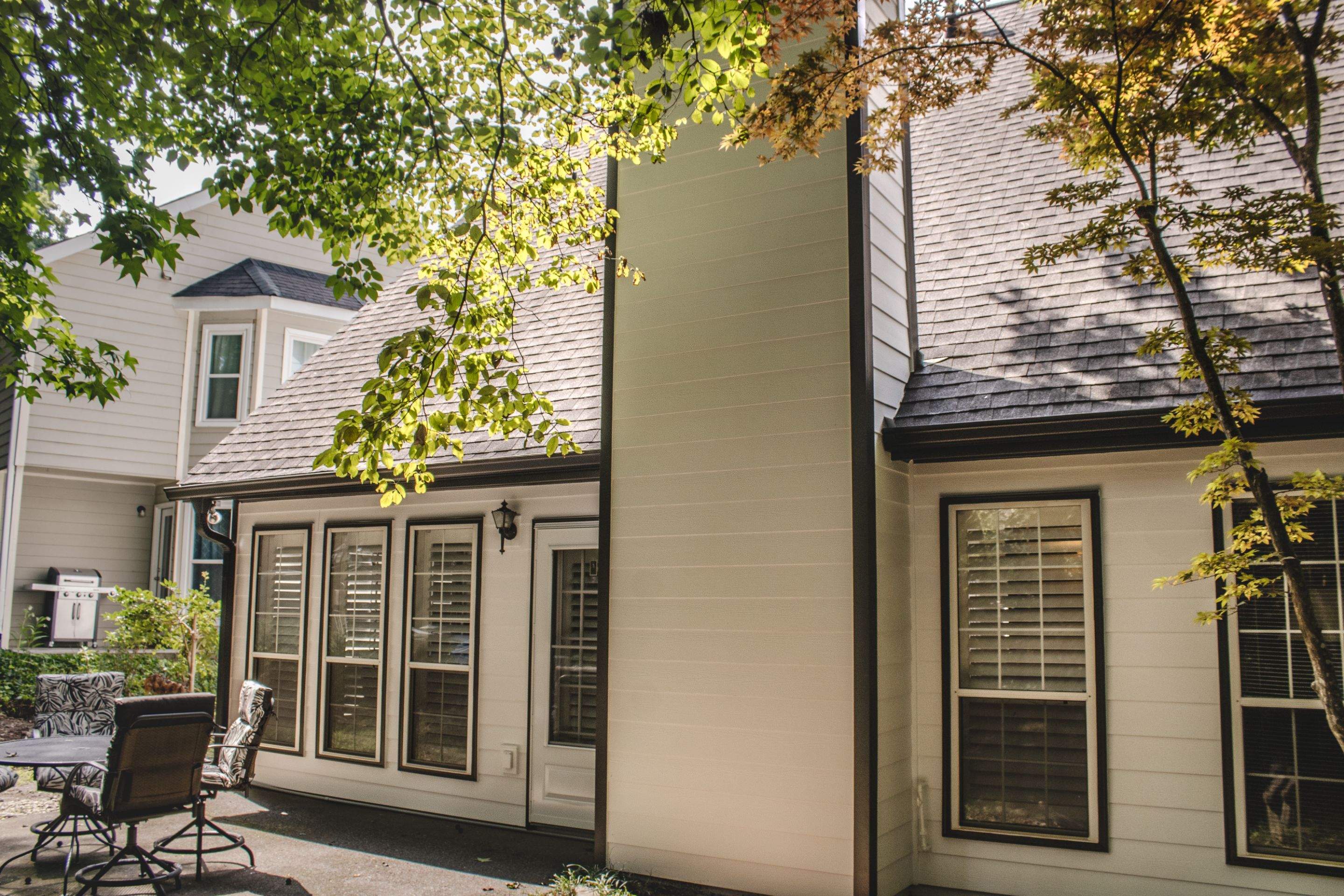 Alpharetta, GA Siding & Exterior Painting with Black Trim Before & After by Nelson Exteriors