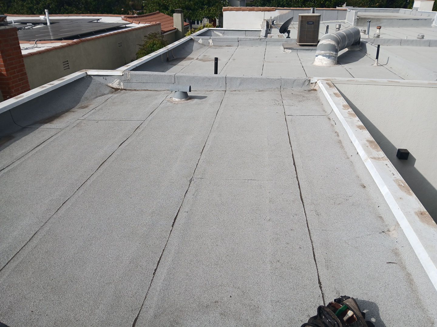 Silicone Membrane Installation using American Standard Coatings Silicone-S by Hull Brothers Roofing