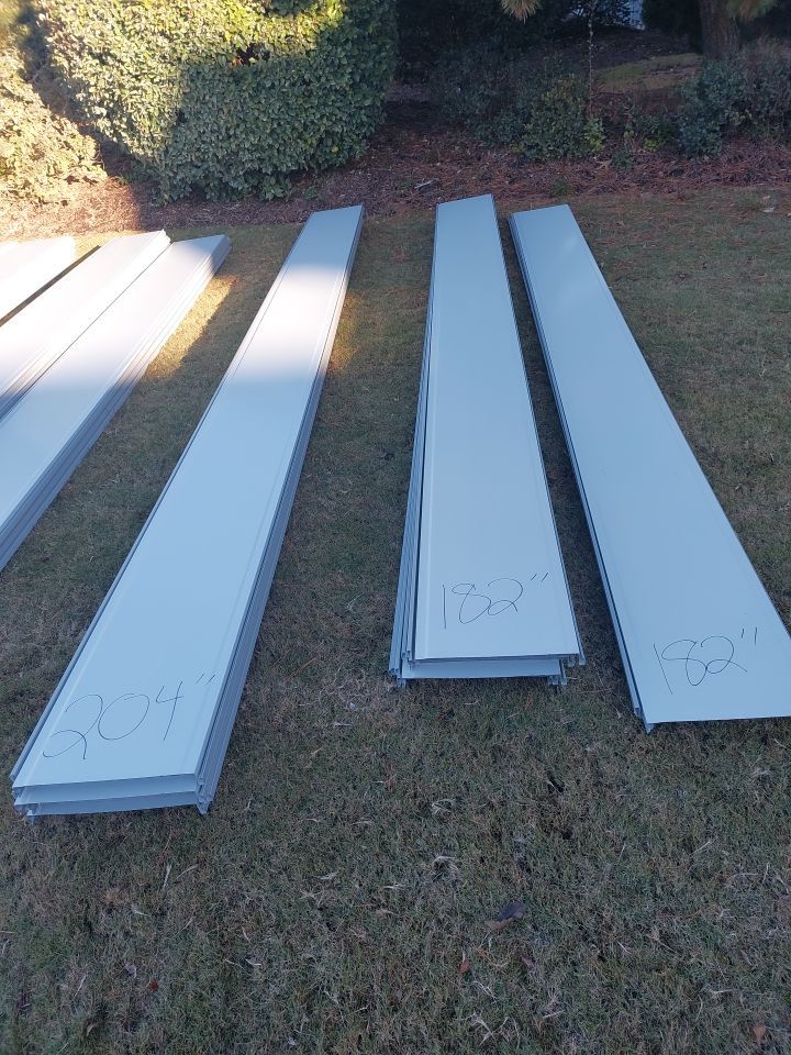 Large Metal Roof Transformation by Gallop Roofing & Remodeling, Inc.