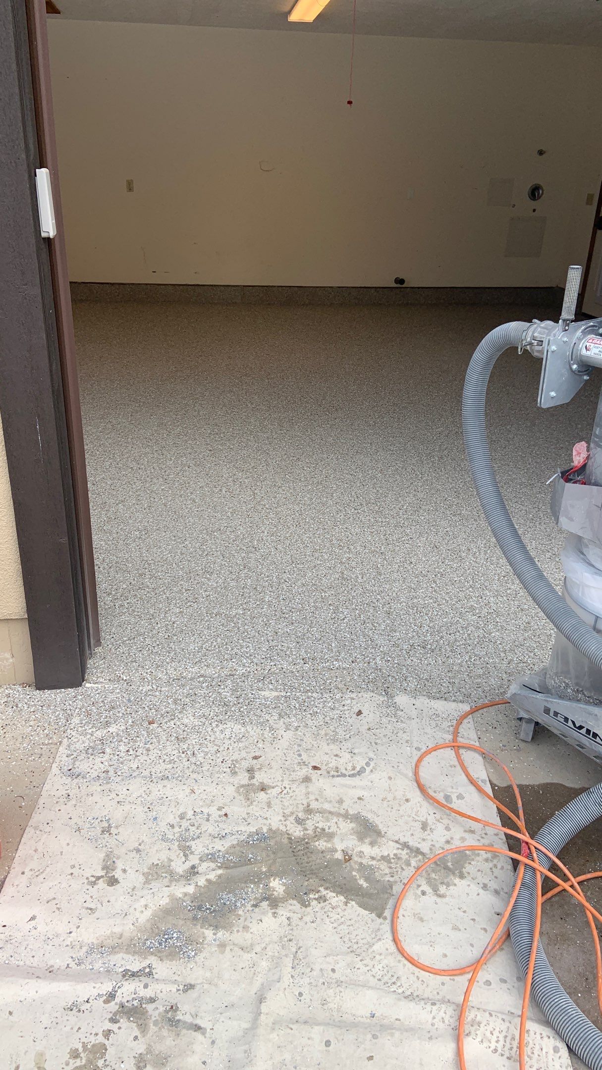 Garage Transformation using Pebble Beach by Croc Coatings, LLC