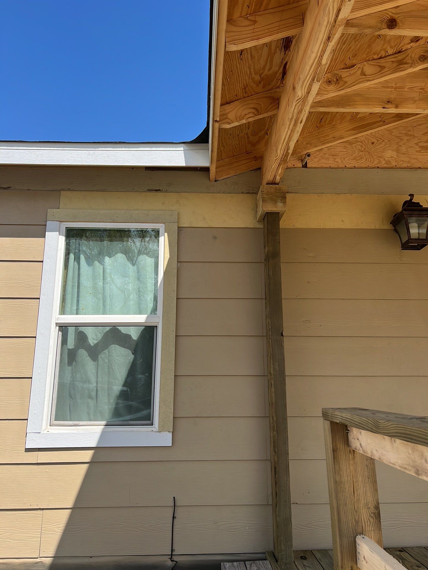 Front Porch Sitt'n by Bayfront Roofing and Construction