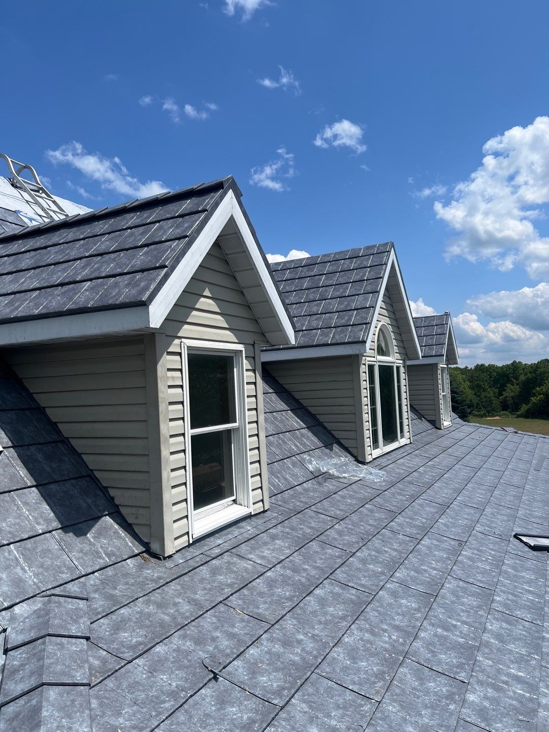 Residential Roofing Installation using ProVia Ironstone Slate Metal Roofing by RoofX 