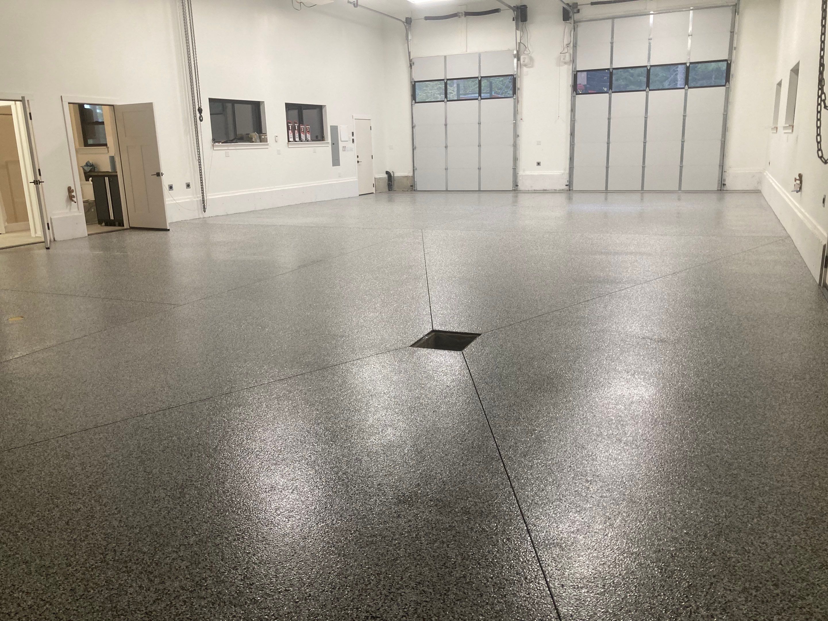 Garage Transformation using Domino and the Penntek Evolution System by Croc Coatings, LLC
