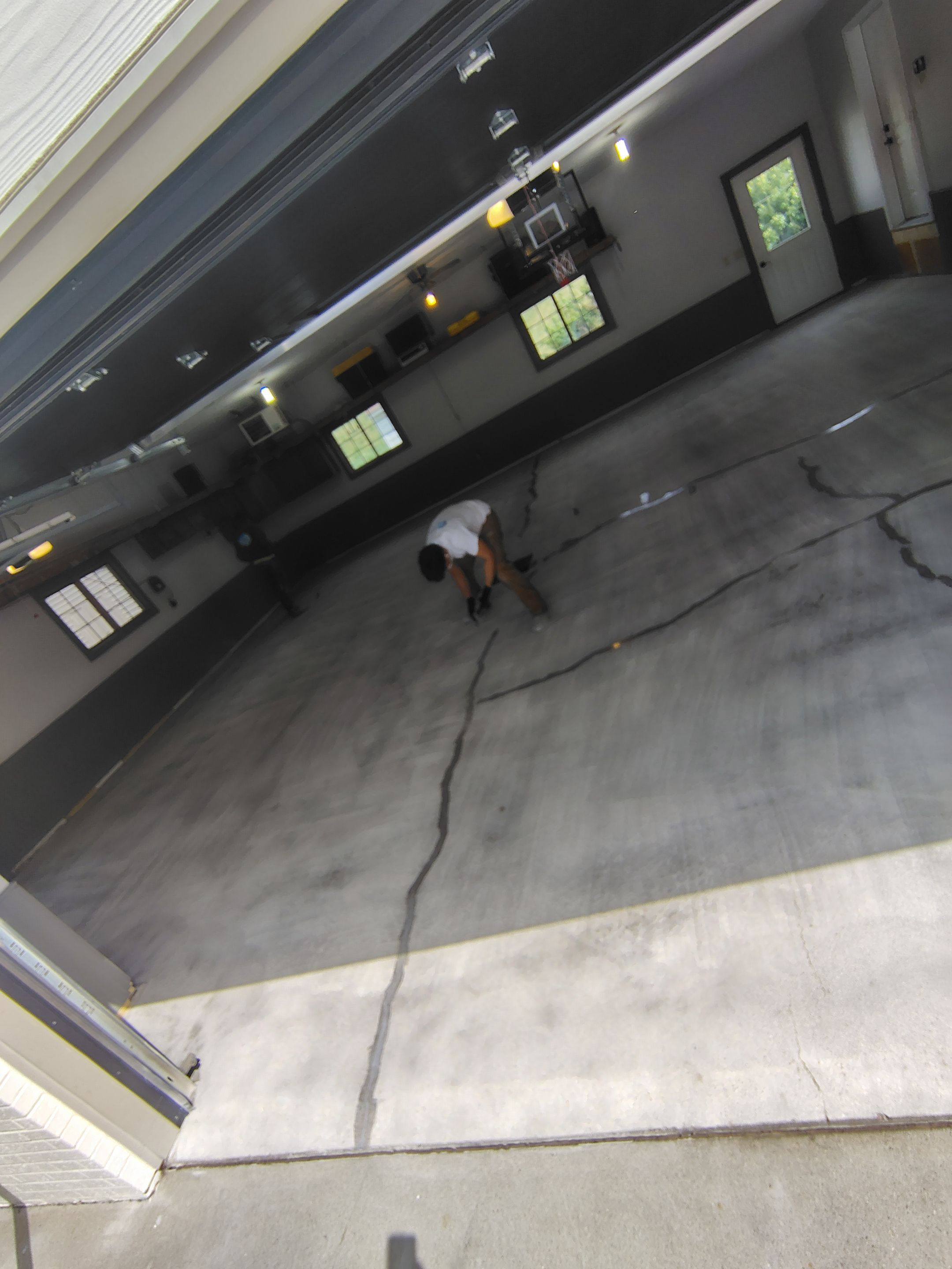 Multi-Fleck Epoxy Garage Floor Coating in Dell Rapids by Select Painting, Coatings & Garage Cabinets