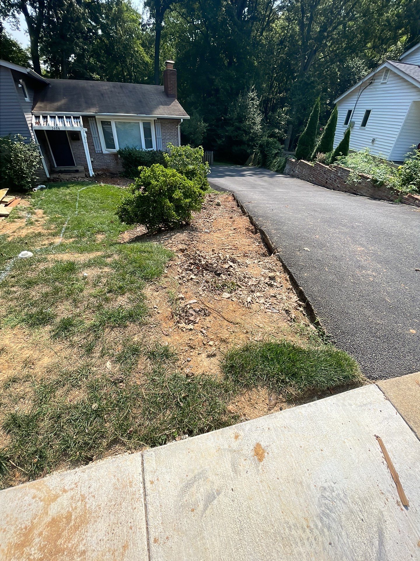 New walkway with stairs and a new front porch by Fairfax Contractors, LLC