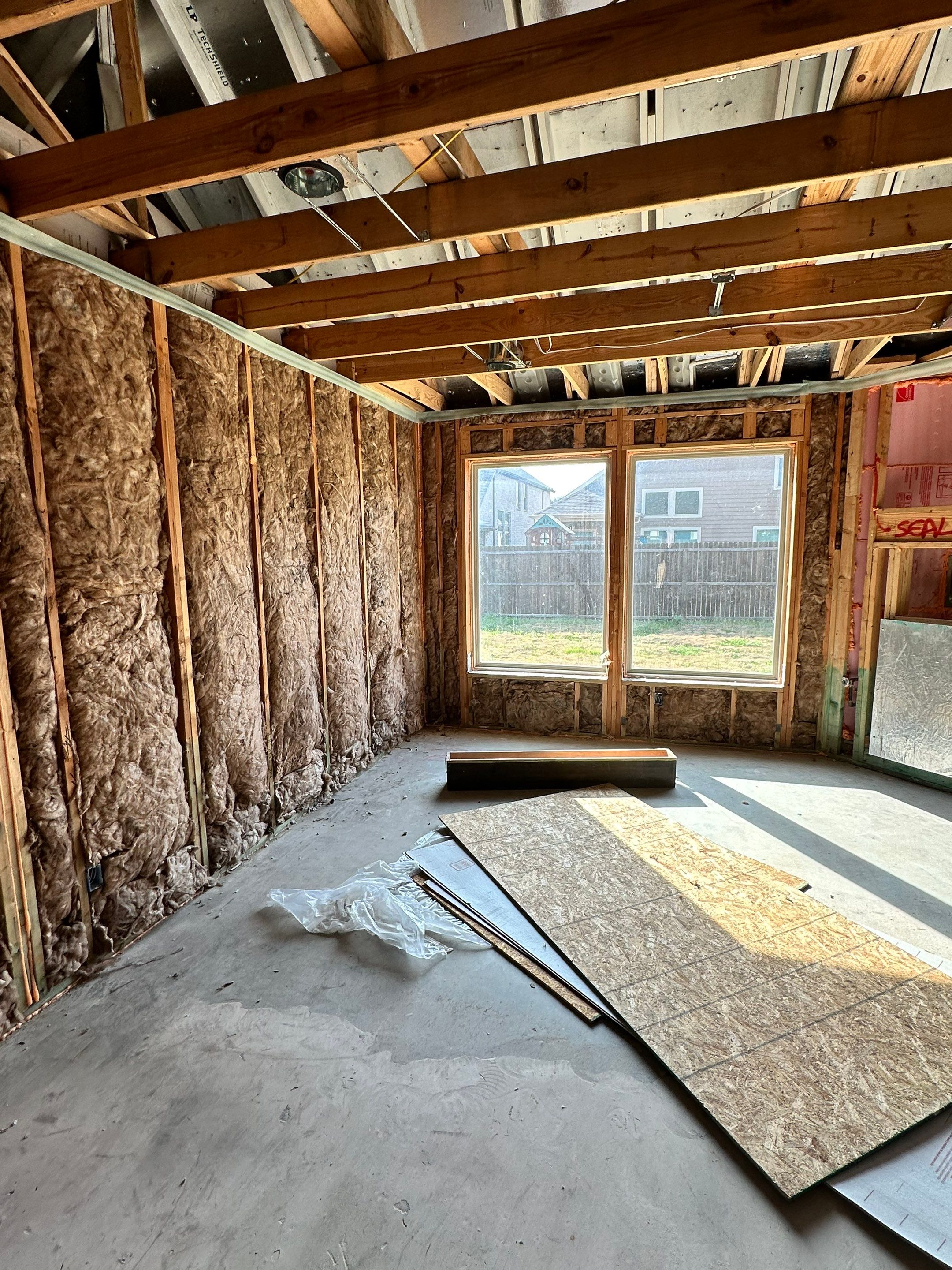 Fiberglass batt install on new construction home in Ft Worth by Apex Insulation Solutions