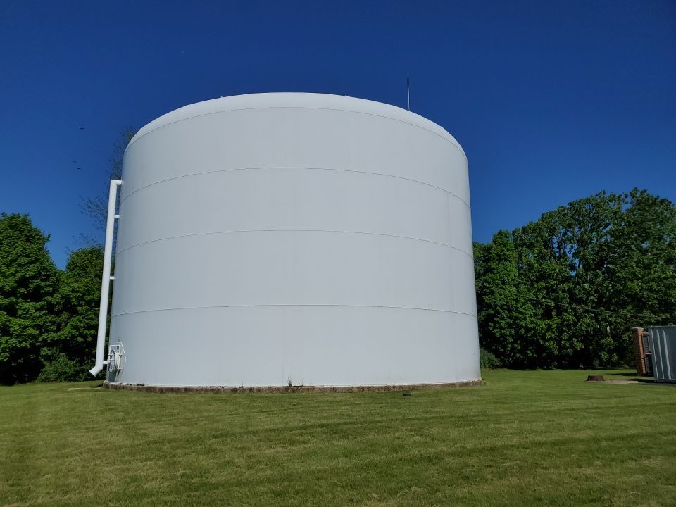 Water tank cleaning by Northern Power Washing LLC.