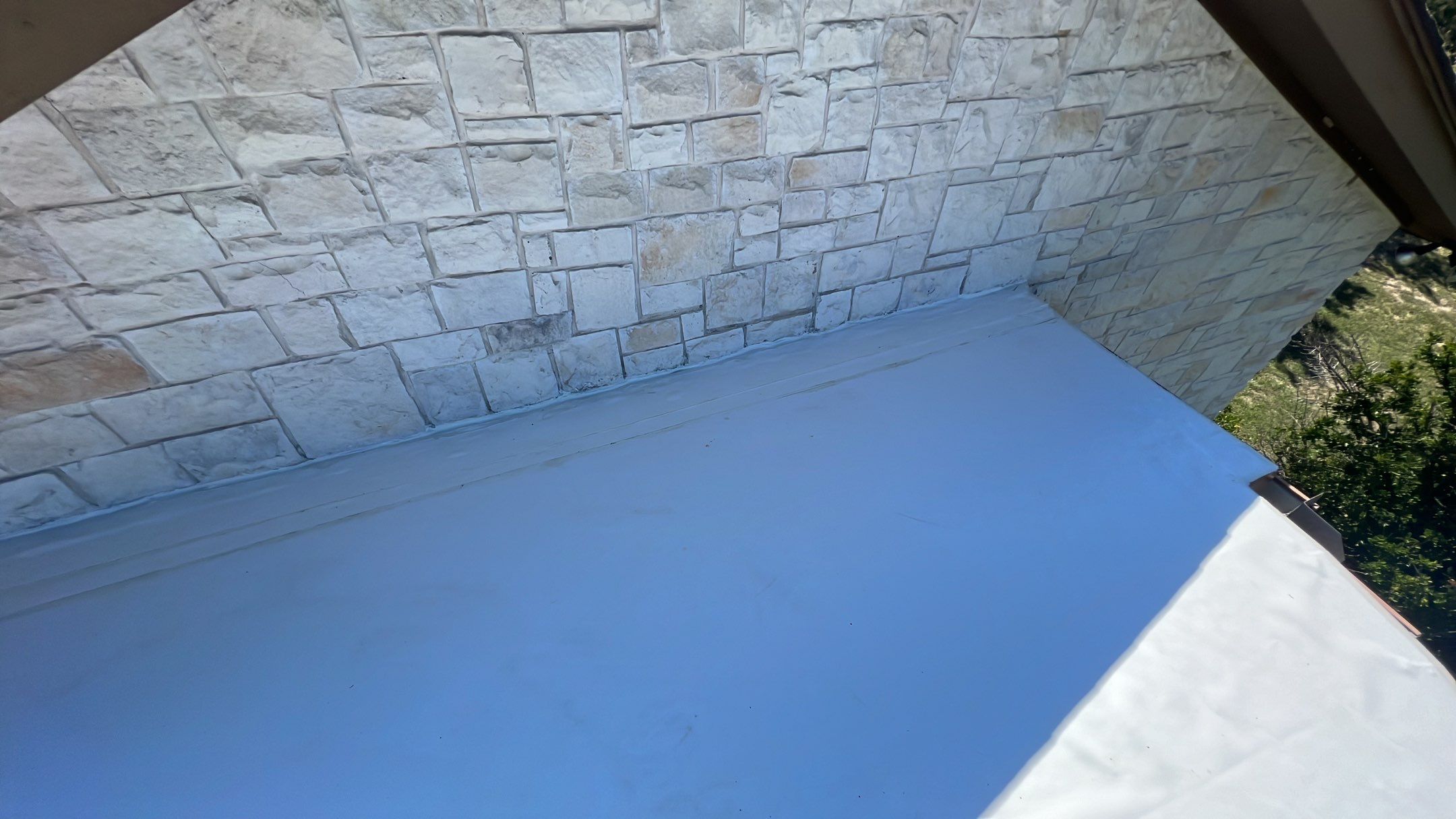Residential Roofing Installation using TPO Flat Roof by Harvey Roofing & Construction