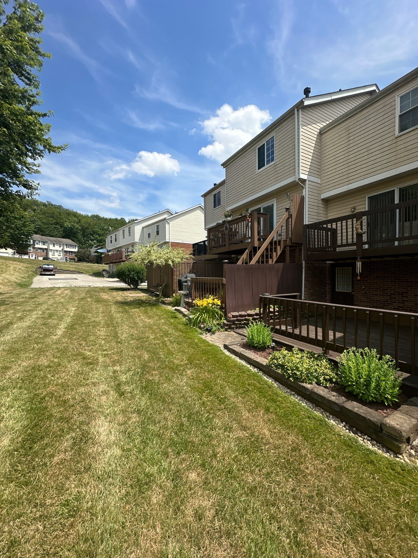 Stamped concrete and redeck  by Cousins Roofing Siding & Decks