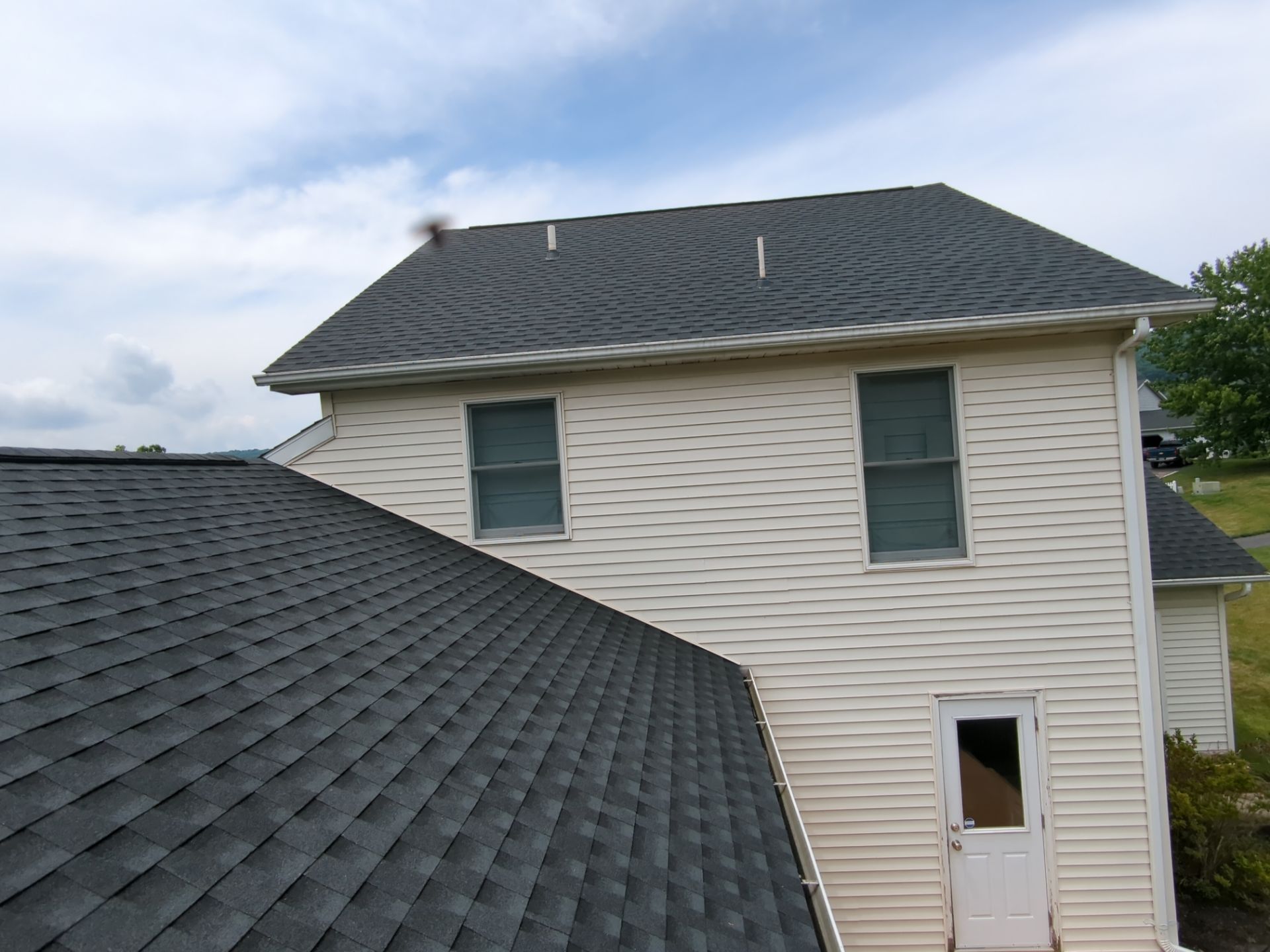 GAF Roof and ProVia Door Upgrade by Esh Builders