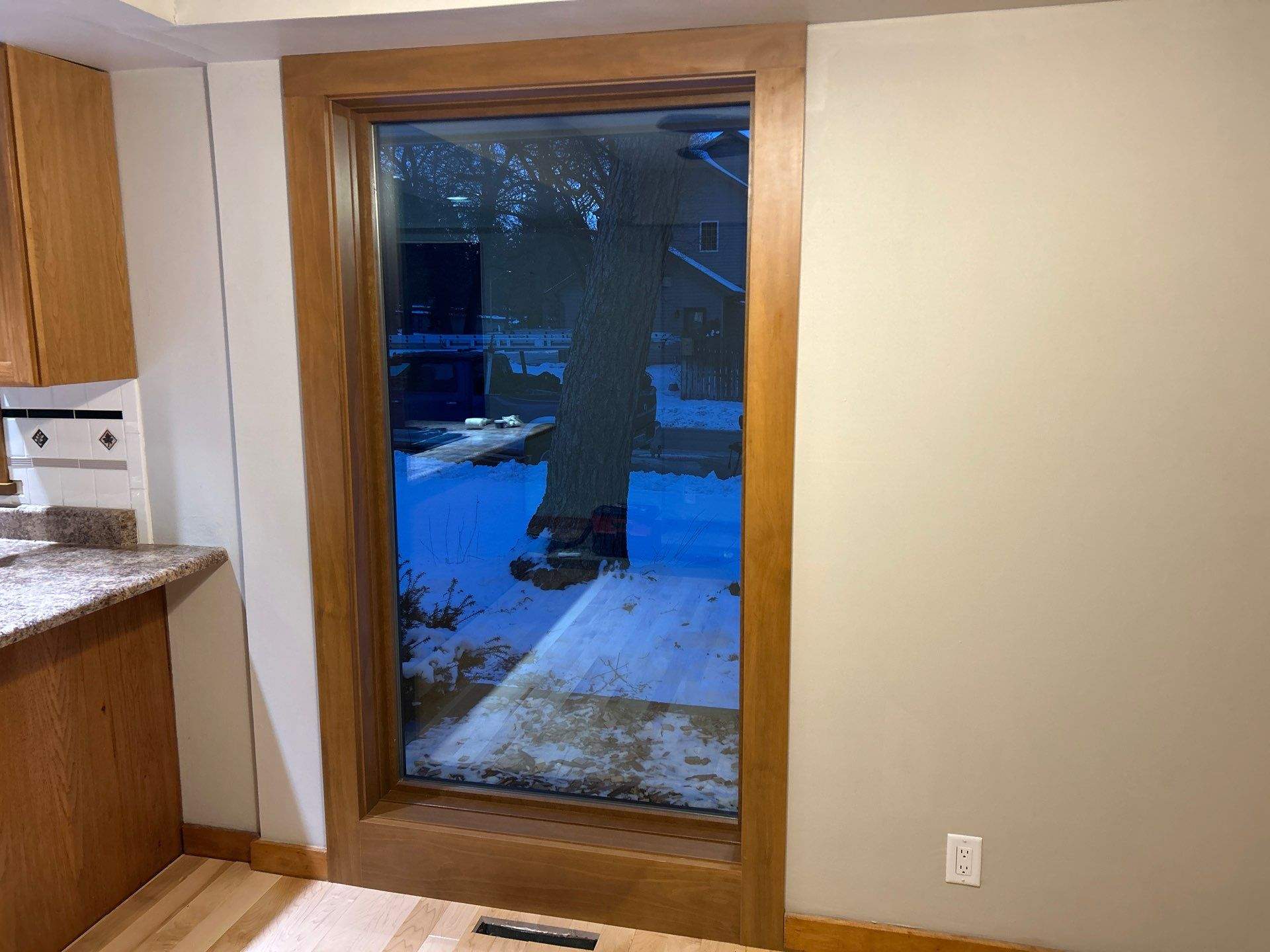 Black-Frame Pella Lifestyle Upgrade on a Partial Brick Home by United Windows and Siding LLC