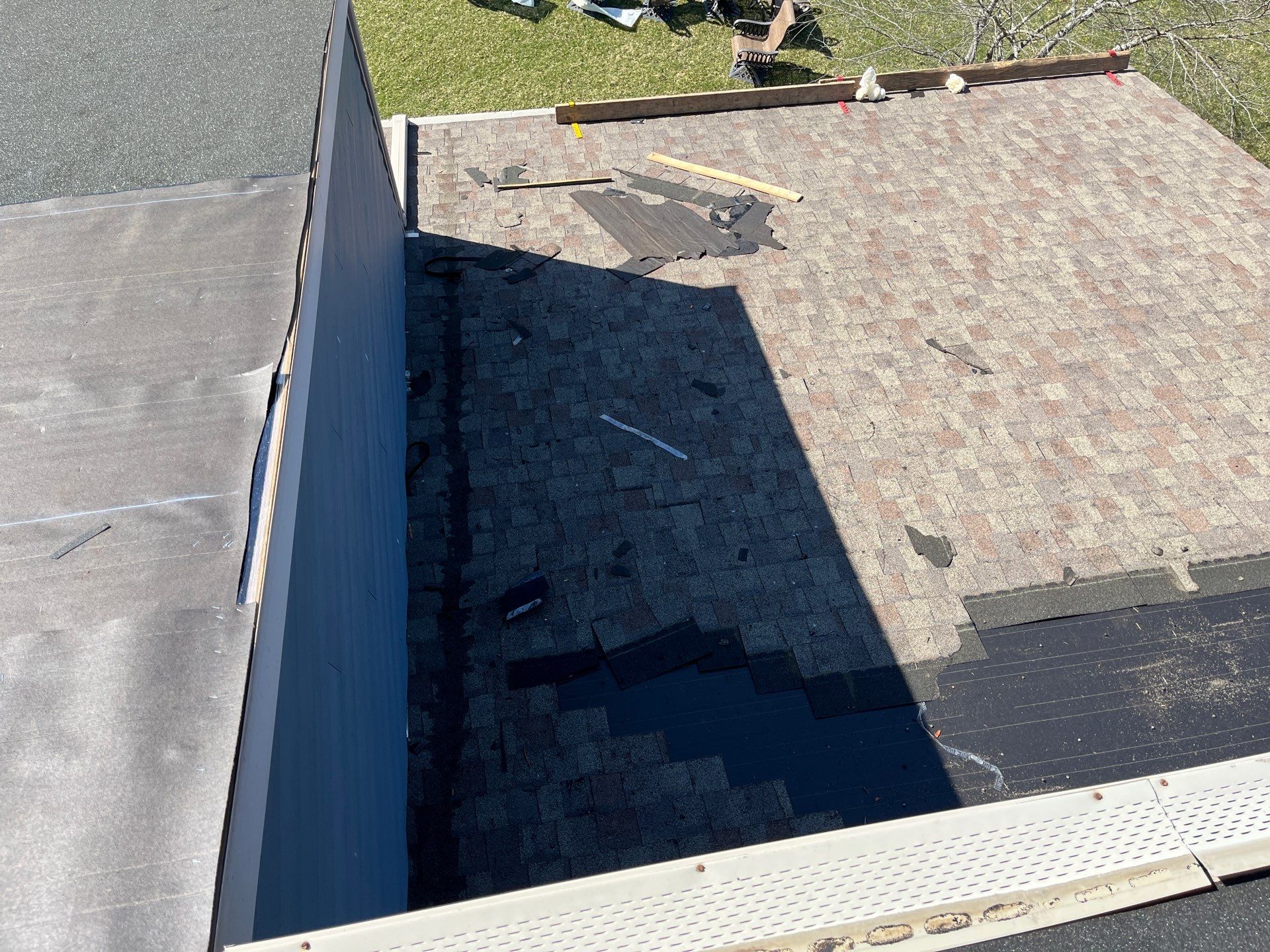 Asphalt Roof Replacement by Custom Installations