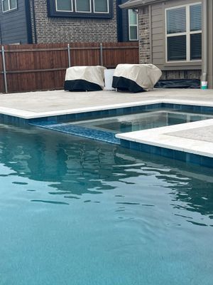 Geometric Pool with Raised Water Feature Wall